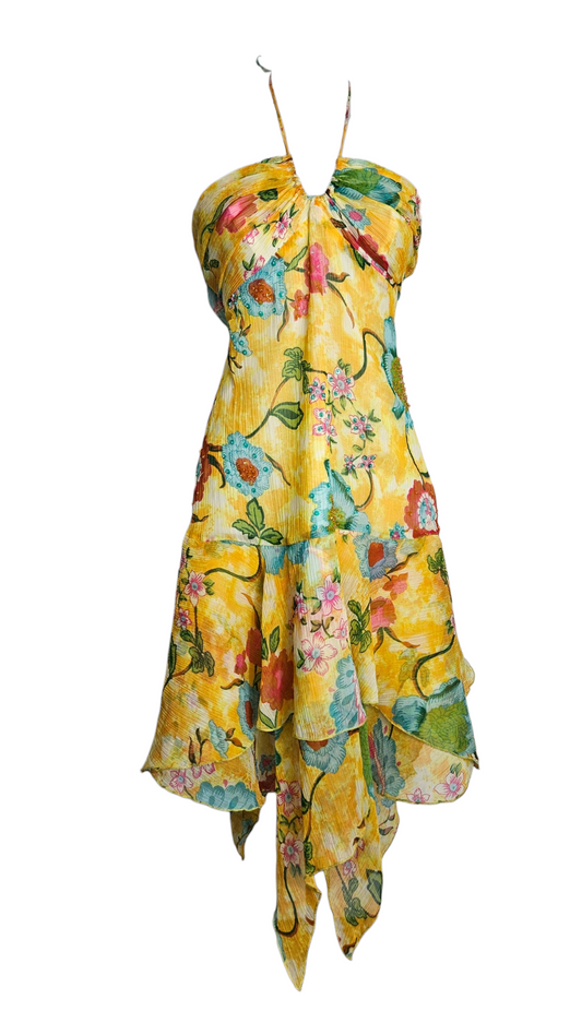 Vintage Y2K yellow floral halter neck dress with pleated fabric, turquoise flower print, and asymmetrical handkerchief hem.