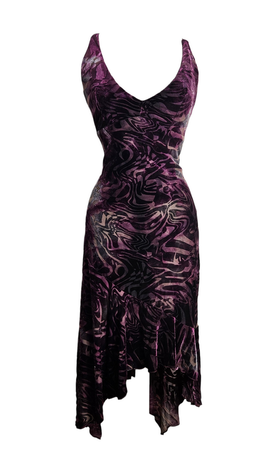 Vintage Y2K purple velvet midi dress with abstract wave pattern, V-neckline, and asymmetrical ruffled hem on a mannequin.