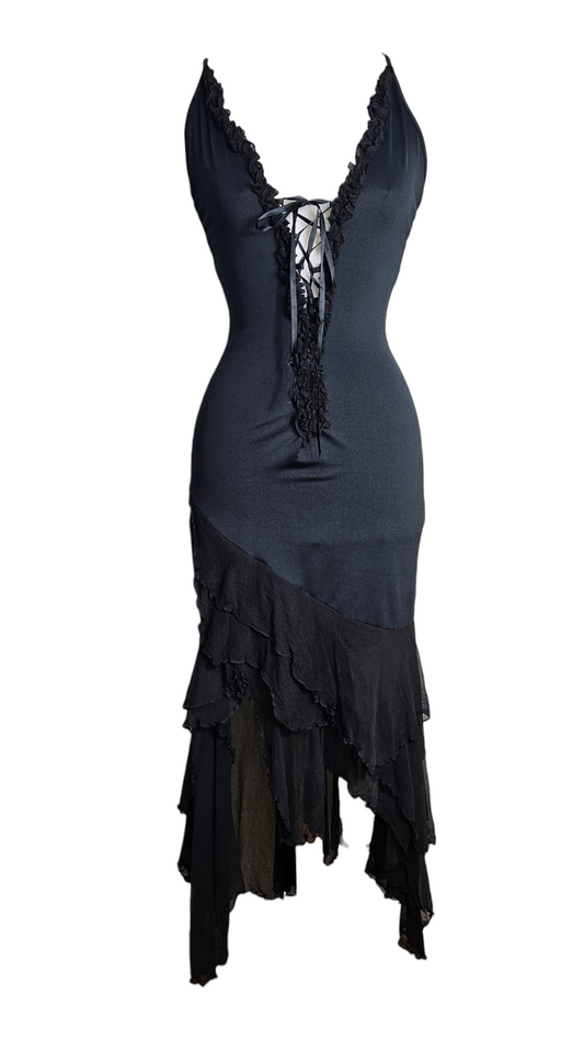 Black Y2K gothic midi dress with lace-up front, ruffled V-neck, and asymmetrical layered mesh hem on a mannequin.