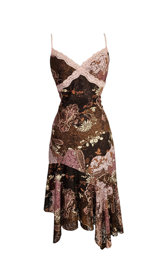 Y2K vintage midi slip dress with pink lace trim, brown paisley floral pattern, and asymmetrical ruffle hem on a mannequin.