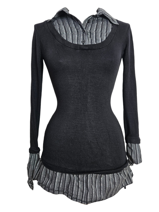 Black long-sleeve mesh top layered over a grey striped shirt with collar and ruffled hem. Cyber Y2K grunge aesthetic on a mannequin.