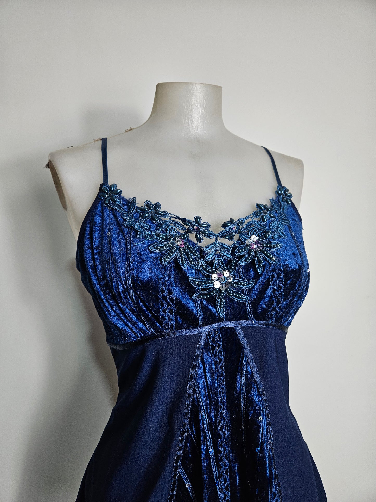 Asymmetrical top with velvet and rhinestone details