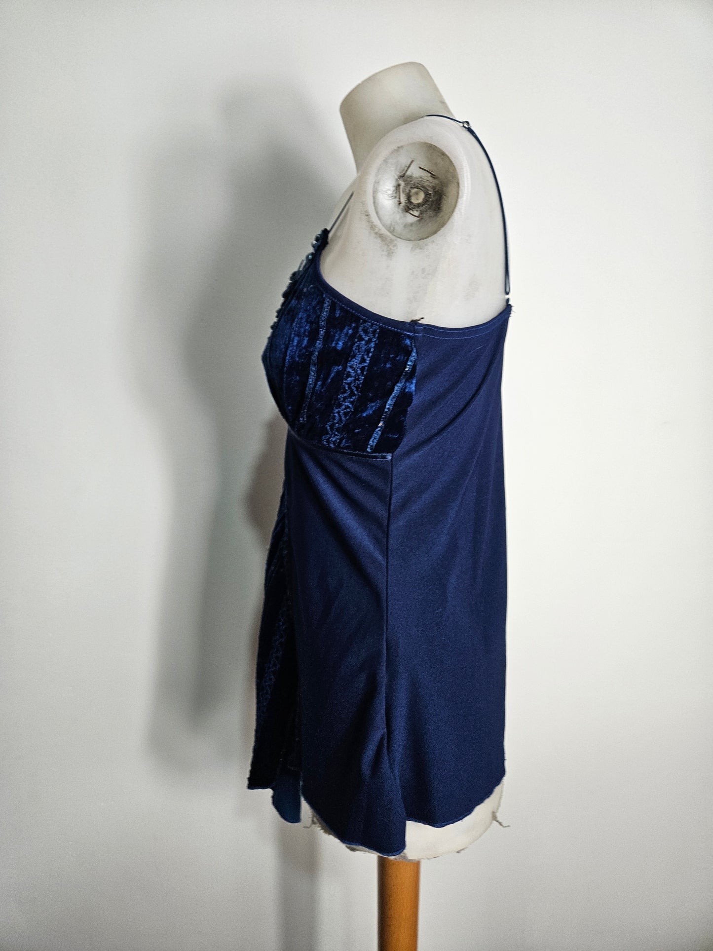 Asymmetrical top with velvet and rhinestone details