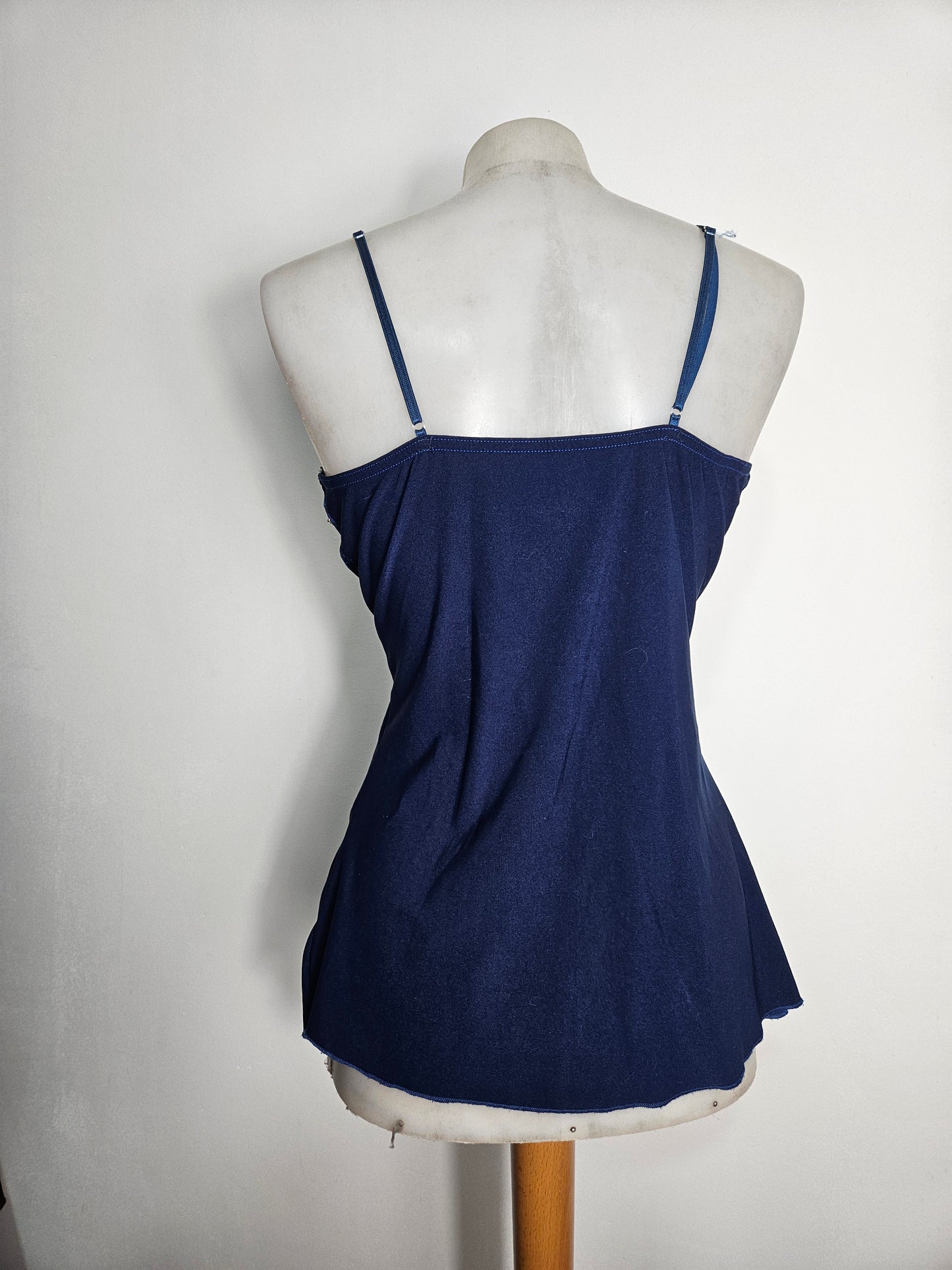 Asymmetrical top with velvet and rhinestone details