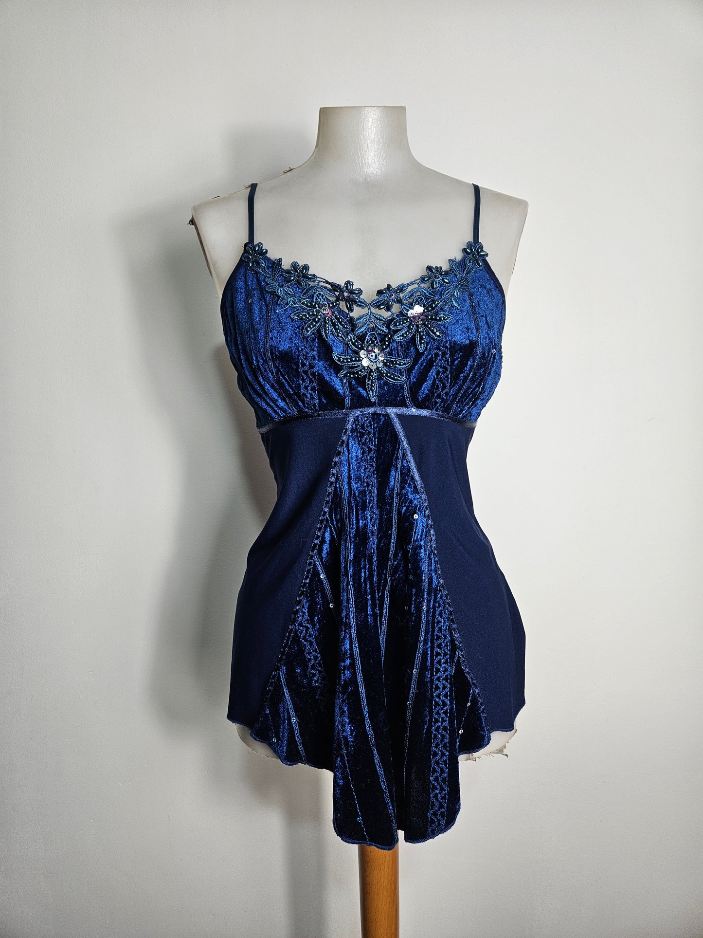 Asymmetrical top with velvet and rhinestone details