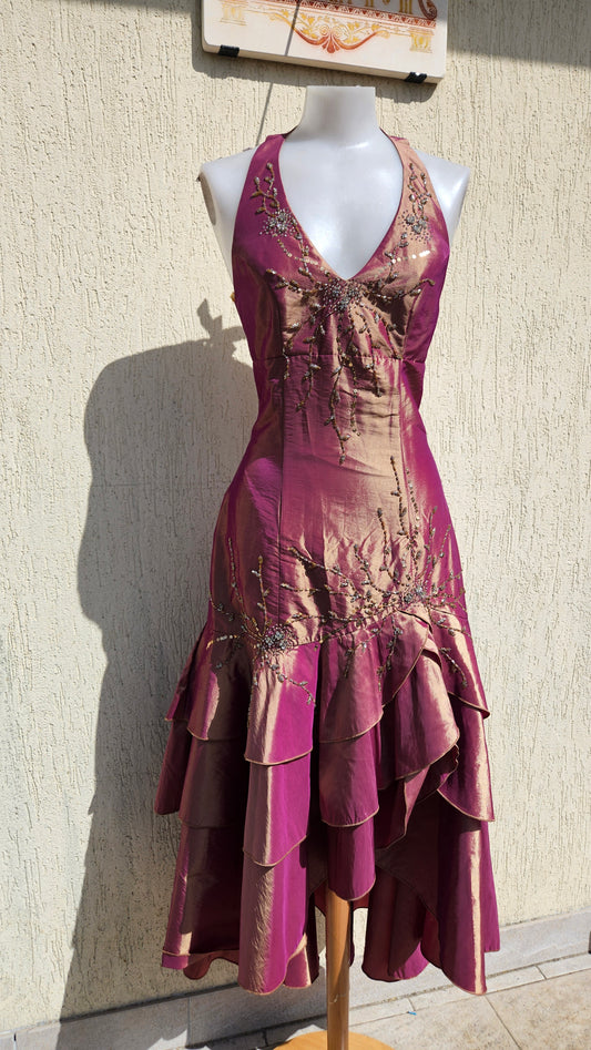 Y2K iridescent magenta halter prom dress with bronze floral beadwork and tiered ruffle high-low skirt.