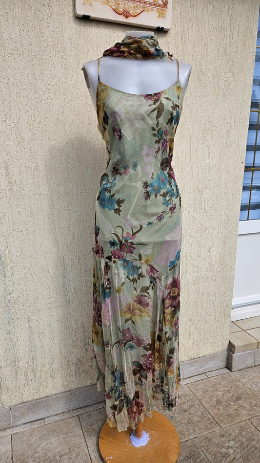 Vintage Y2K floral silk slip dress with spaghetti straps and beaded accents. Shabby chic 90s aesthetic midi dress on a mannequin.