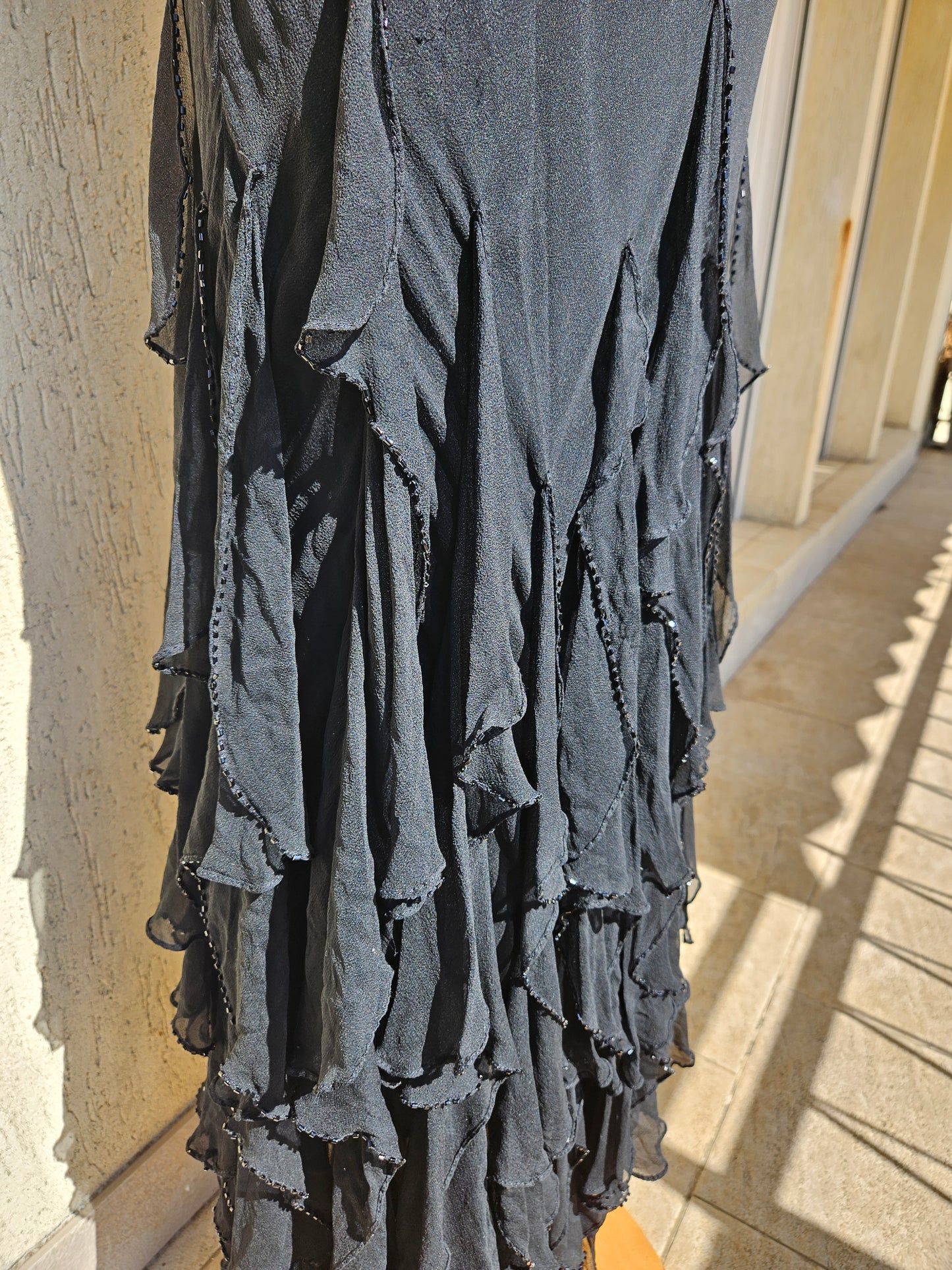 Black ruffled silk dress