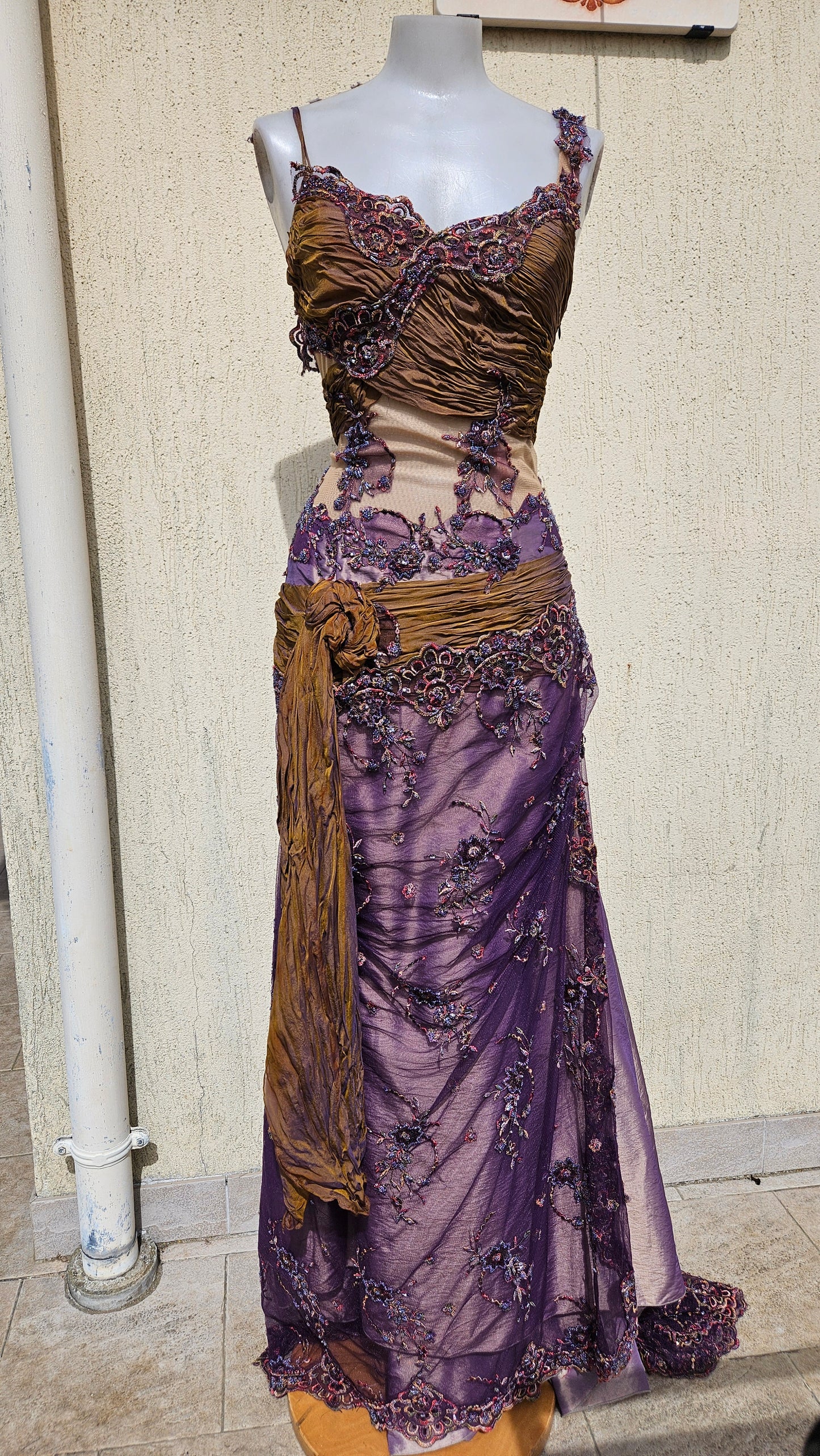 Y2K vintage purple and bronze evening gown with intricate floral beadwork, mesh panels, and draped sash. Elegant 2000s formal dress for special occasions.