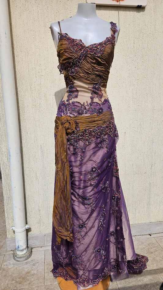 Y2K vintage purple and bronze evening gown with intricate floral beadwork, mesh panels, and draped sash. Elegant 2000s formal dress for special occasions.