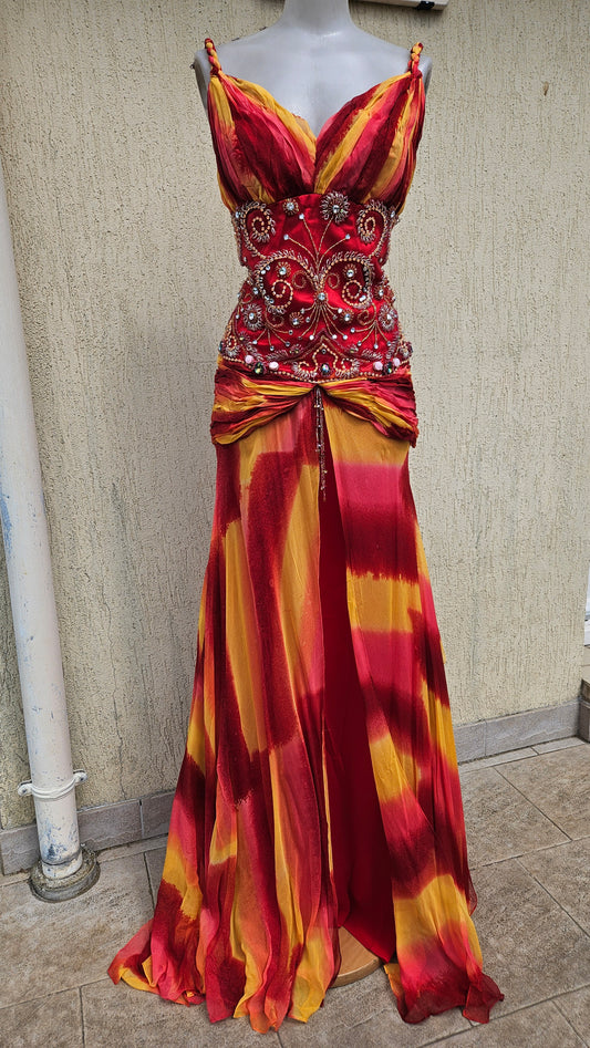 Step into the early 2000s with this stunning Y2K maxi dress. Featuring sunset hues, intricate beading, and a flowy silhouette, it's a true Lucid Dream 2007 gem.