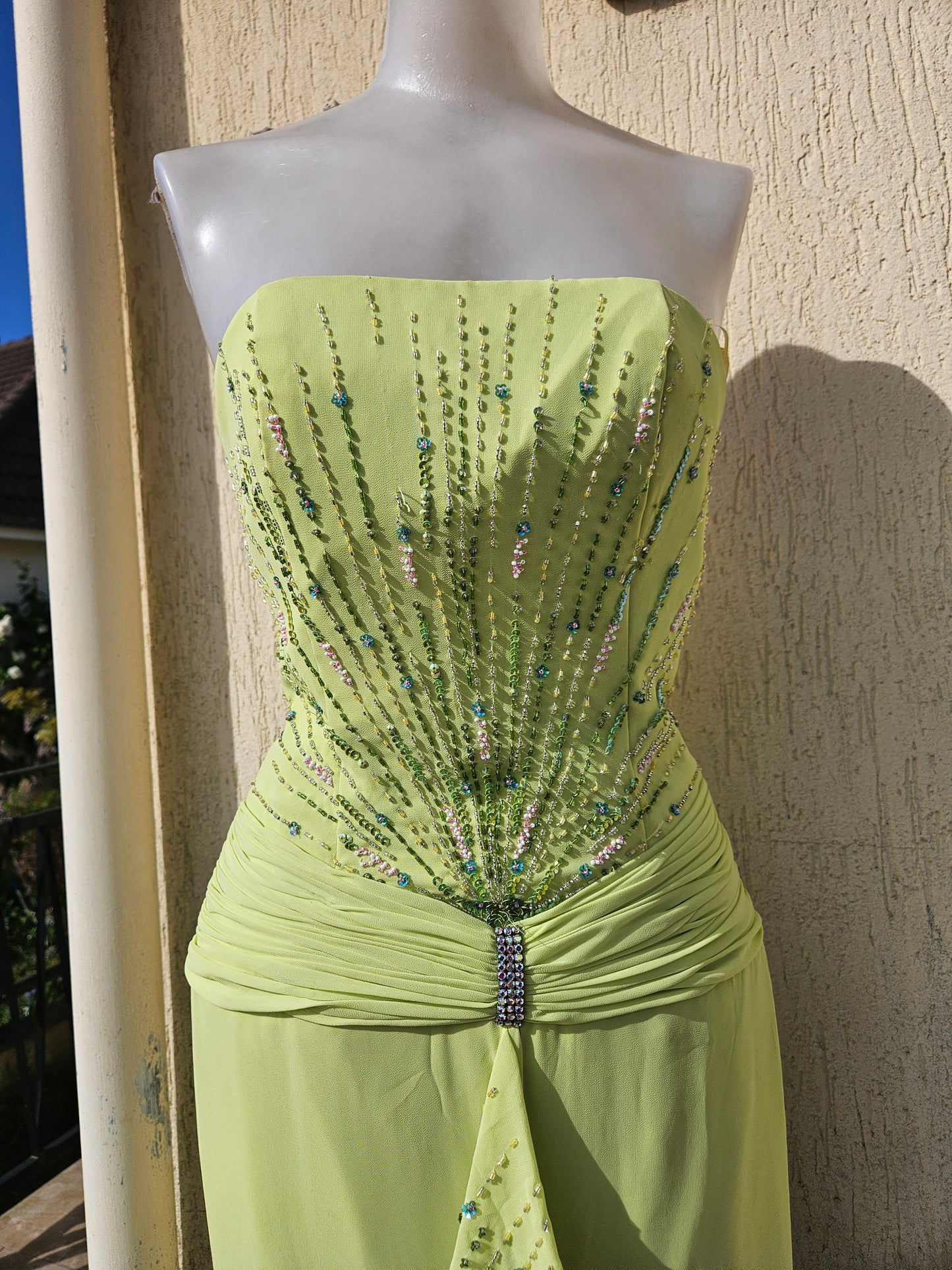 Embroidered green strapless dress