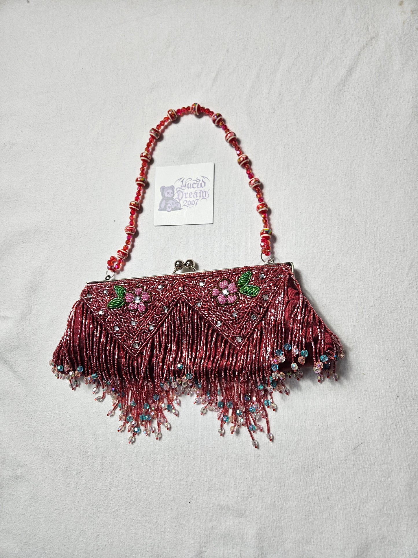 Bolso pequeño rodado rojo