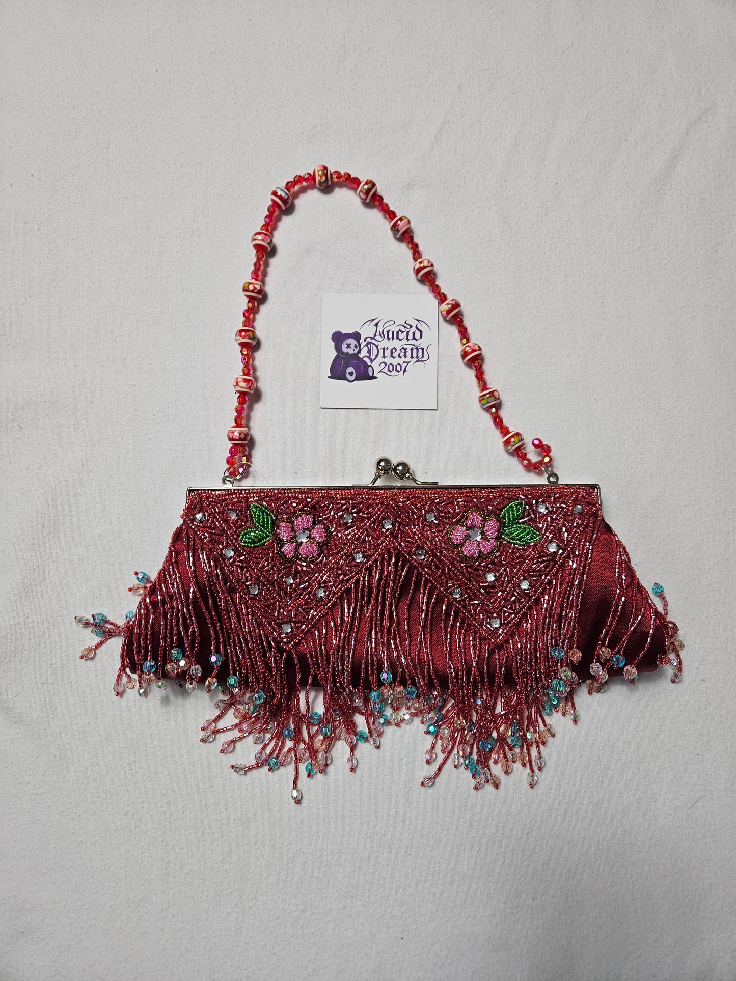 Bolso pequeño rodado rojo