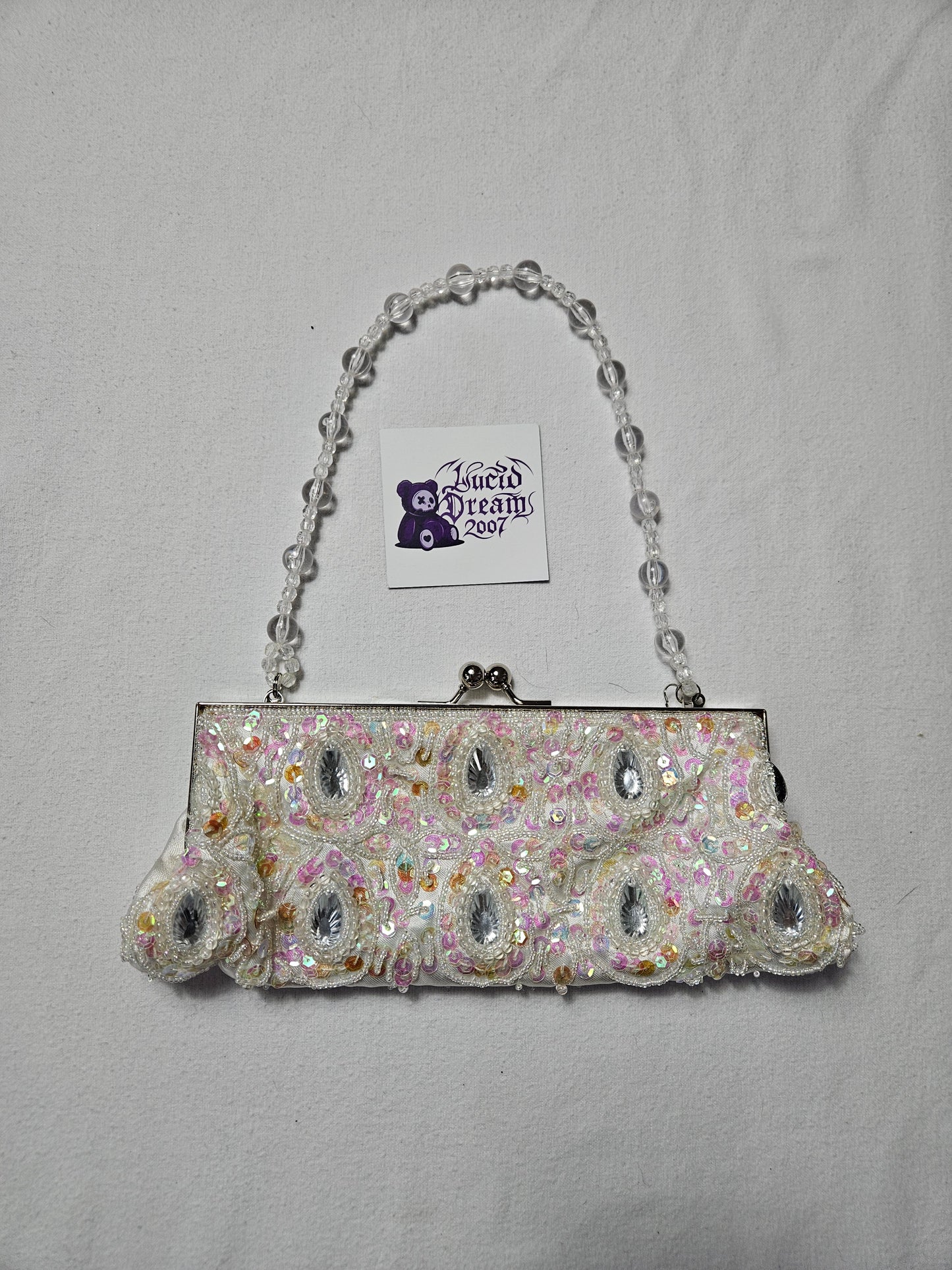 Y2K vintage iridescent white sequin beaded purse with clear bead handle. 90s fairycore princess vibe. Perfect aesthetic for coquette style and party outfits.