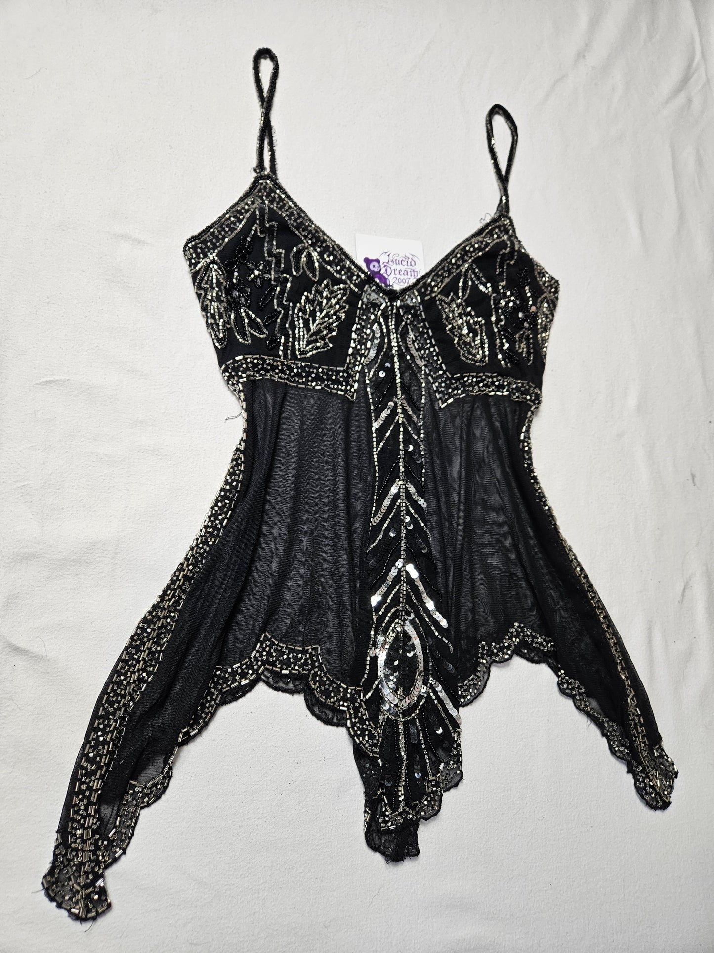 Haut noir asymétrique en voile brodé