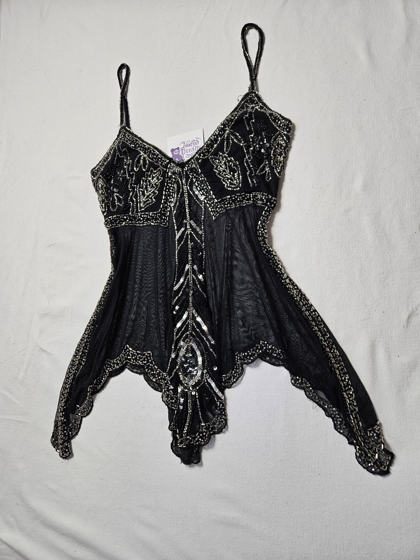 Haut noir asymétrique en voile brodé