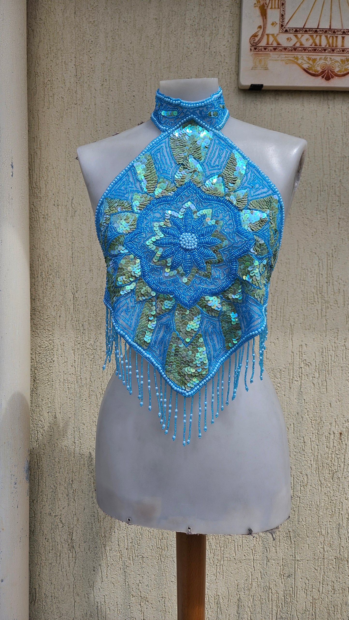 Vintage 90s/Y2K turquoise blue halter neck top. Intricate hand-beaded & iridescent sequin diamond bodice with flower mandala details & hanging fringe. Rave glam.