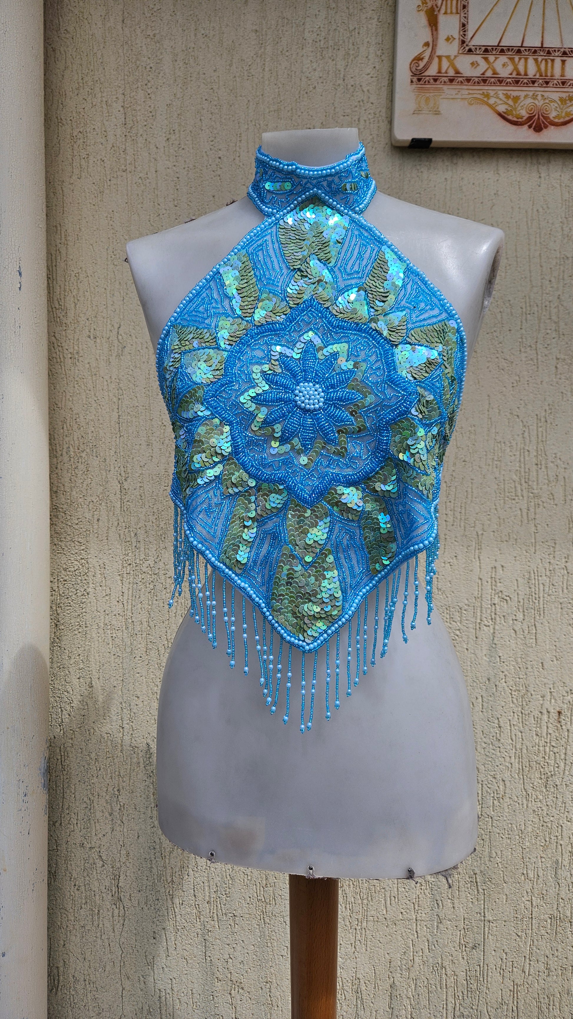 Vintage 90s/Y2K turquoise blue halter neck top. Intricate hand-beaded & iridescent sequin diamond bodice with flower mandala details & hanging fringe. Rave glam.