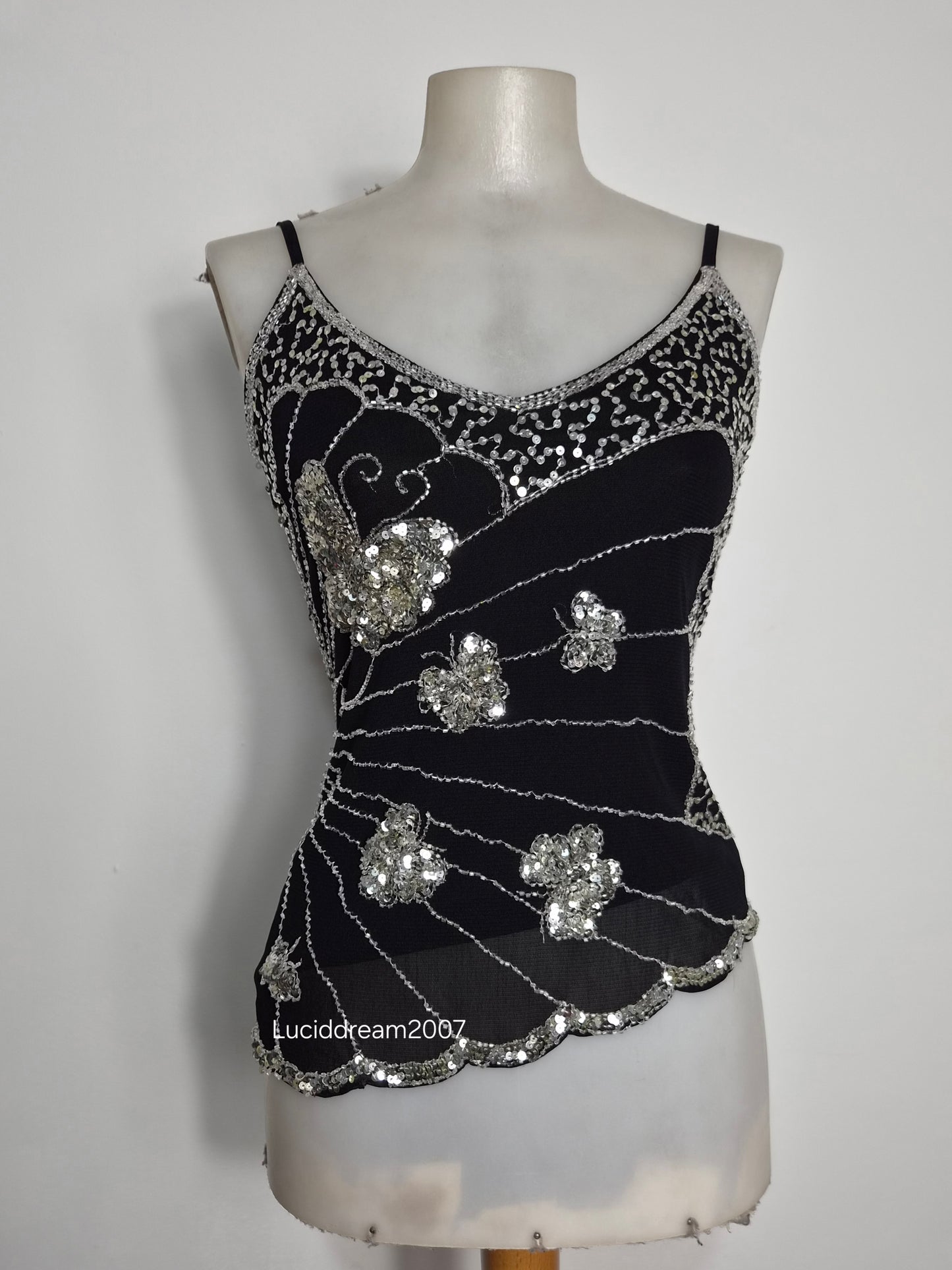 Asymmetric top with butterfly embroidery