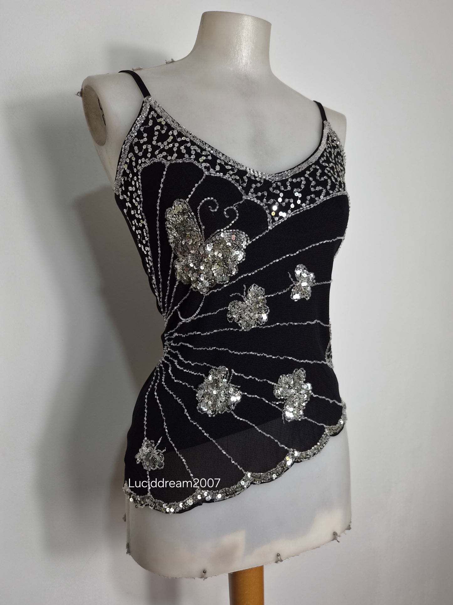 Asymmetric top with butterfly embroidery