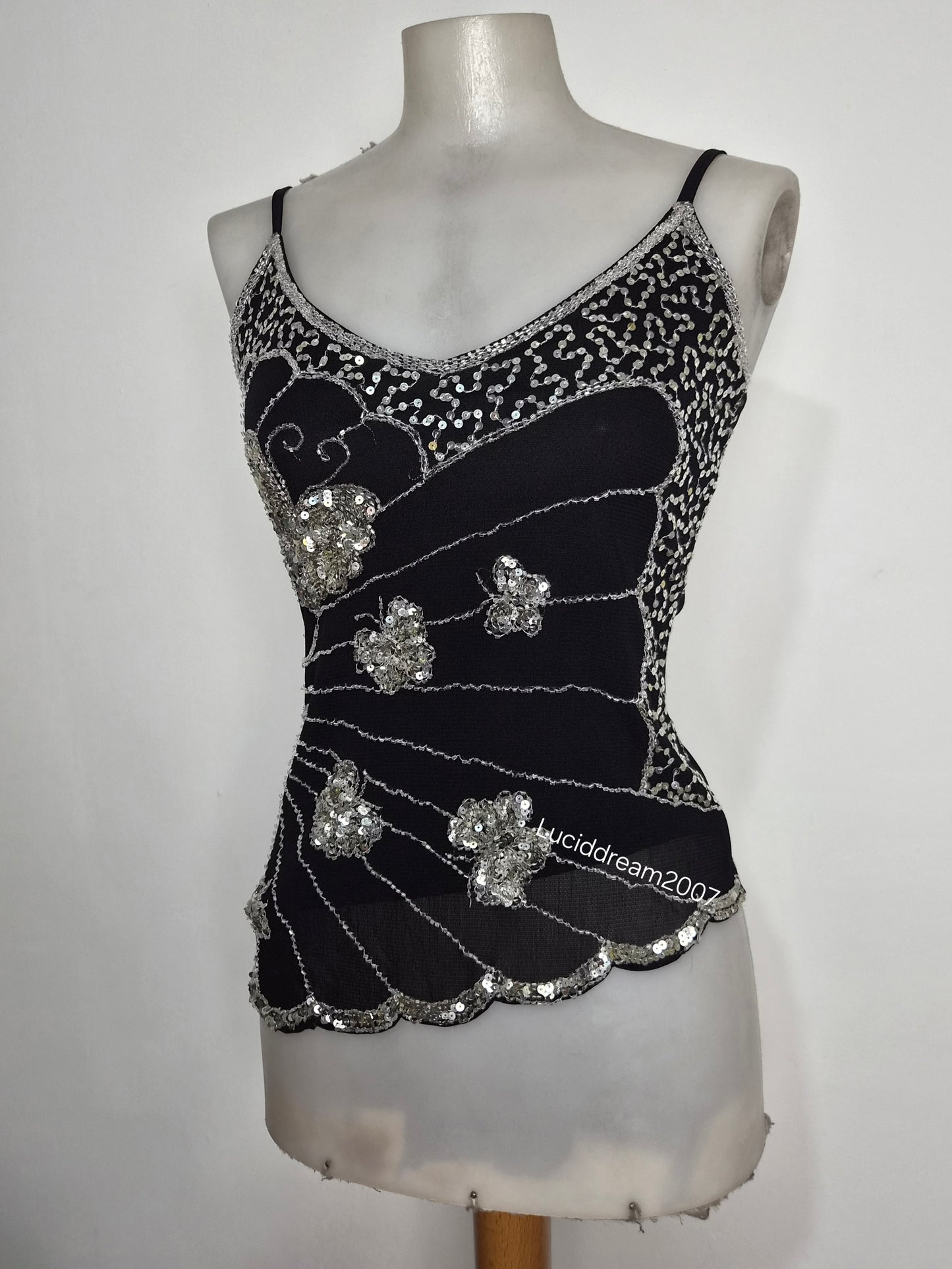 Asymmetric top with butterfly embroidery