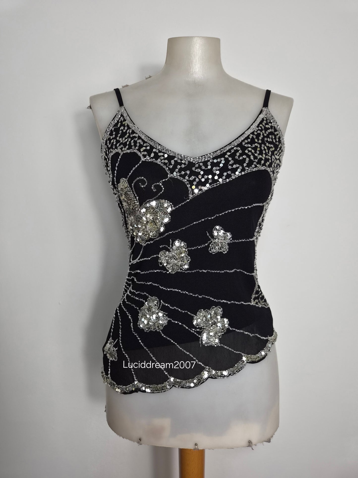 Asymmetric top with butterfly embroidery