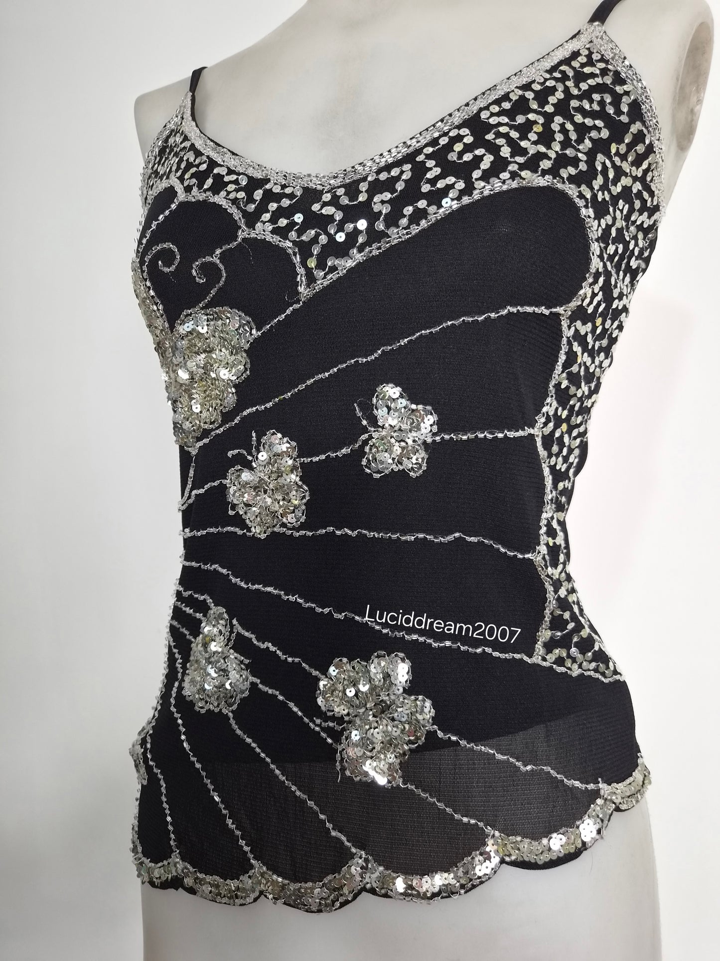 Asymmetric top with butterfly embroidery
