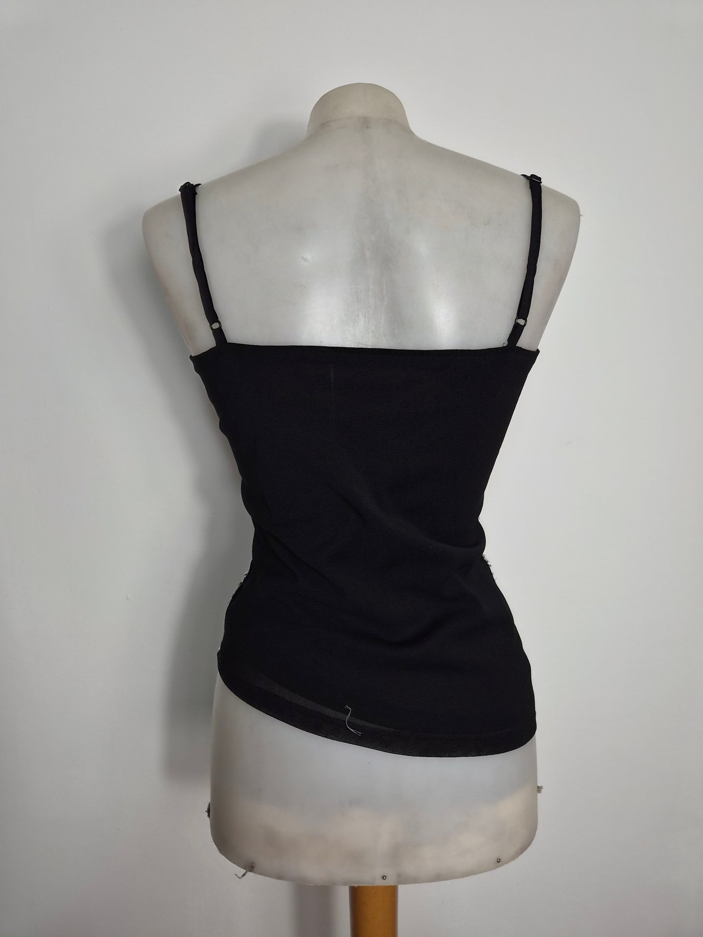 Asymmetric top with butterfly embroidery