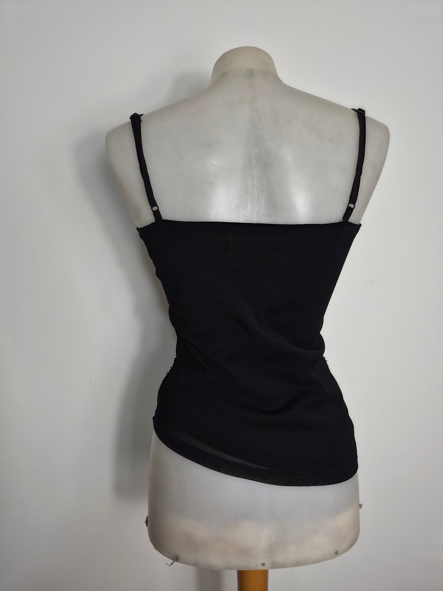 Asymmetric top with butterfly embroidery