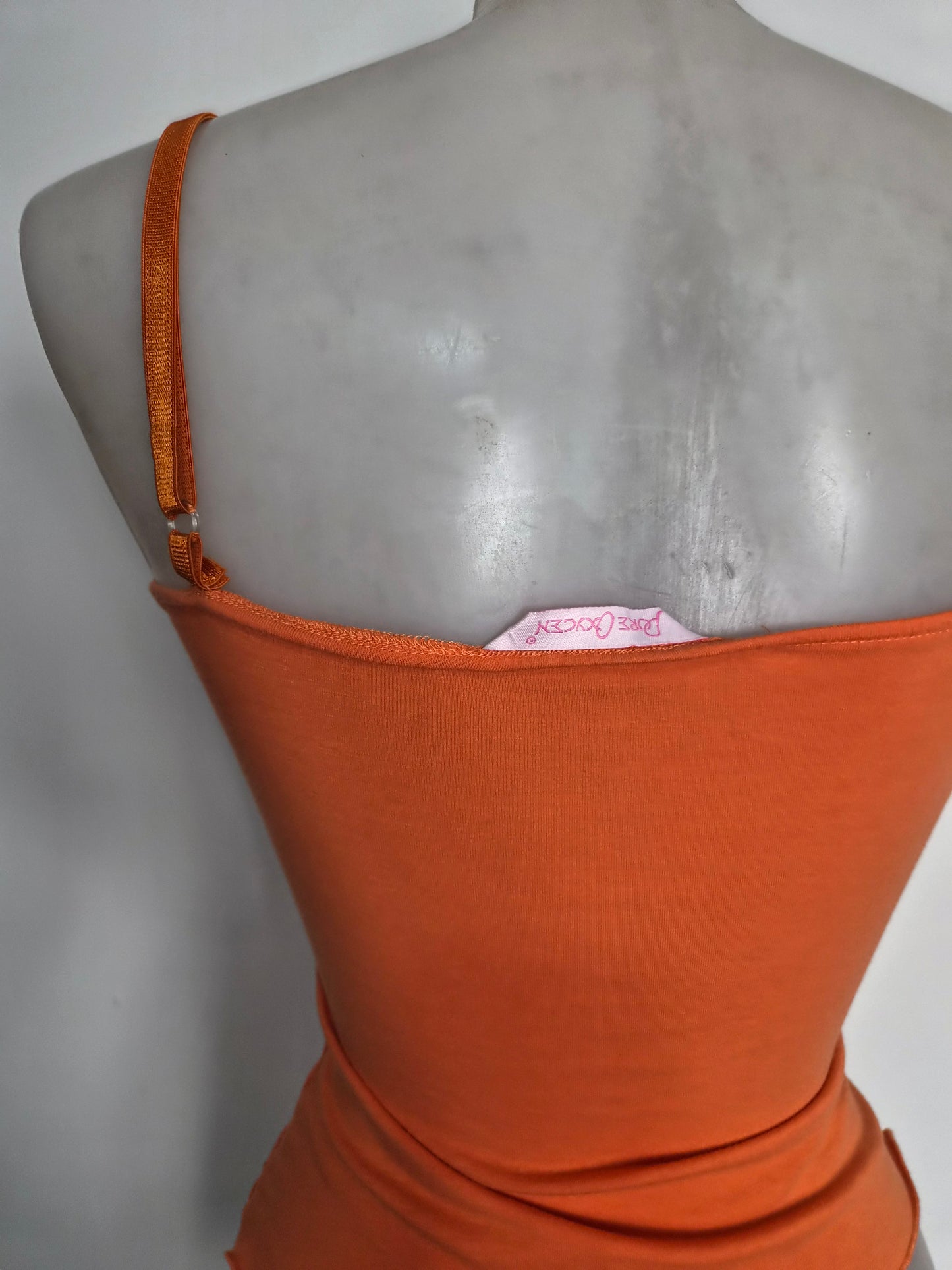 Haut asymétrique à laçage orange