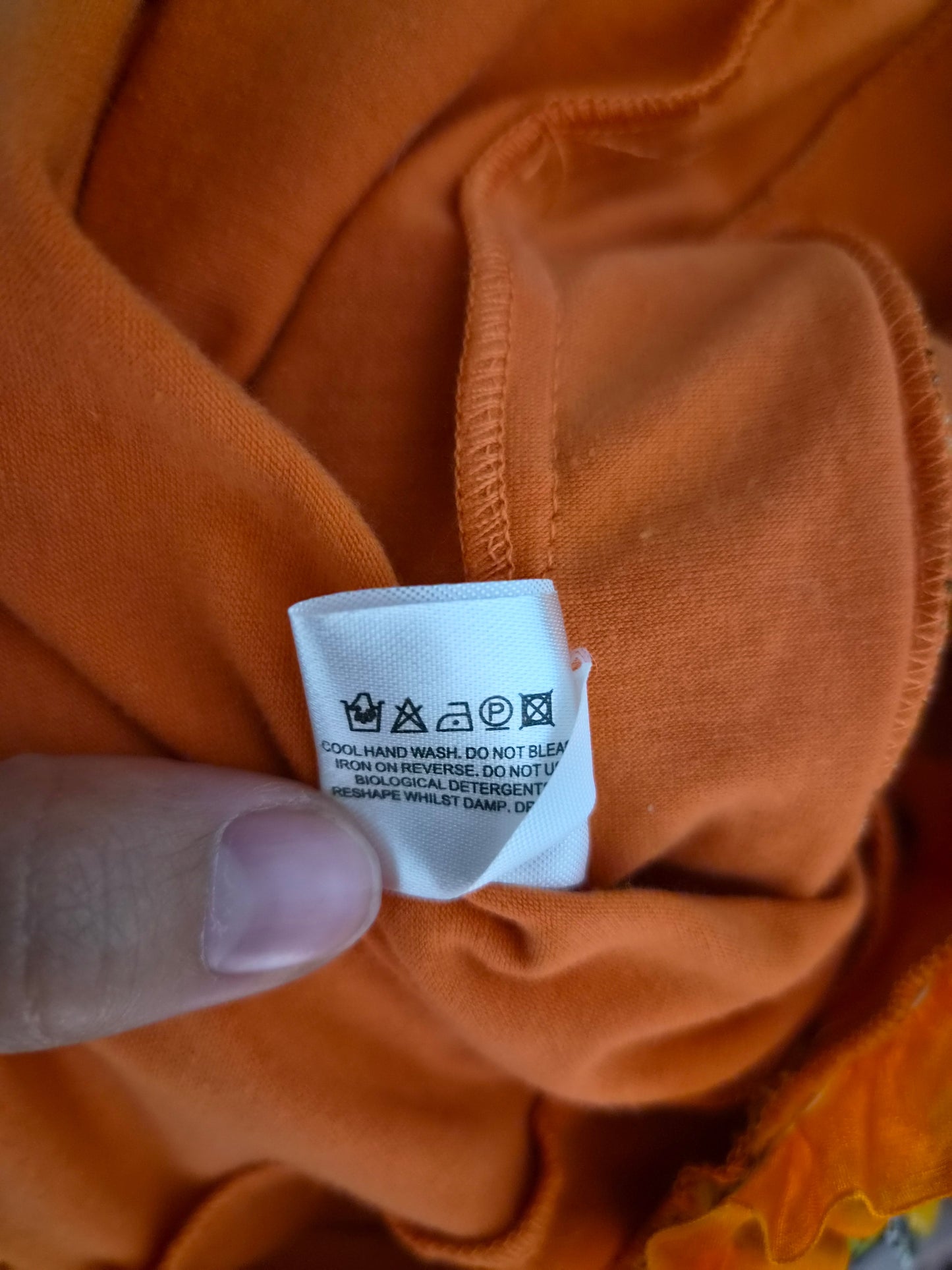 Haut asymétrique à laçage orange