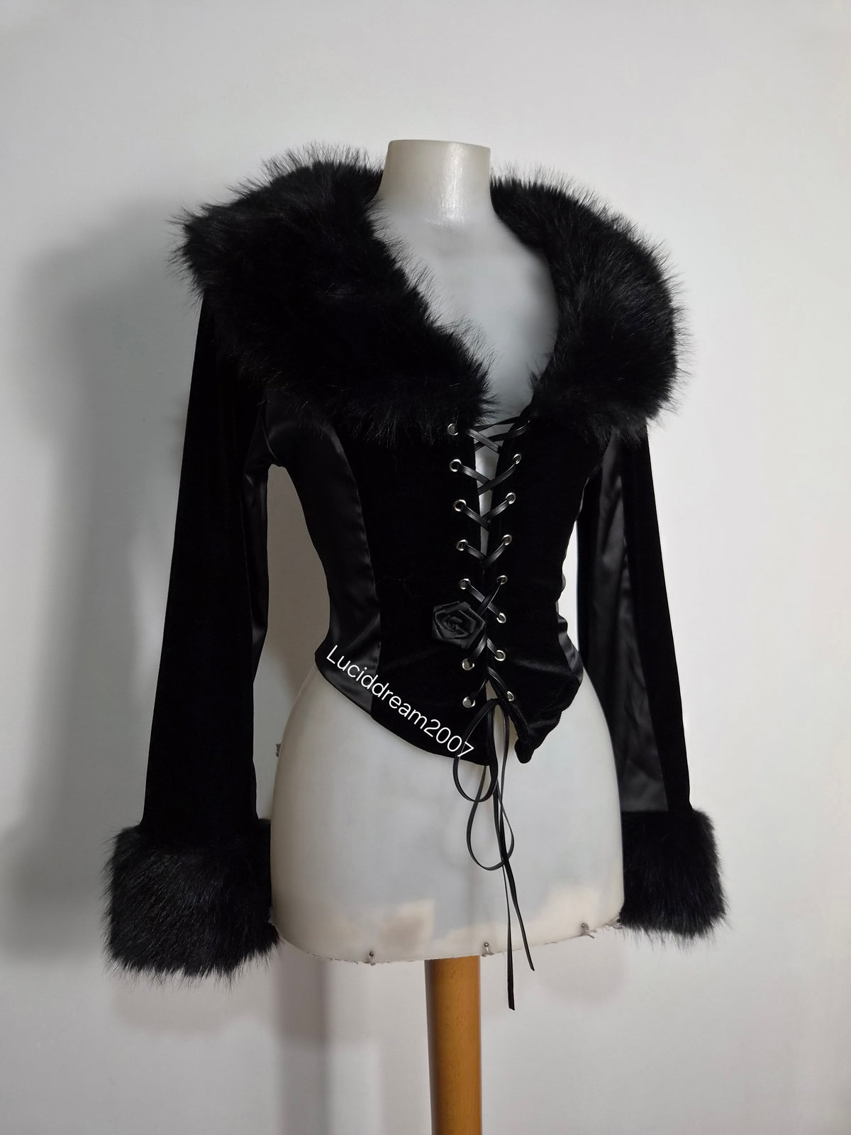 Black top with faux fur collar
