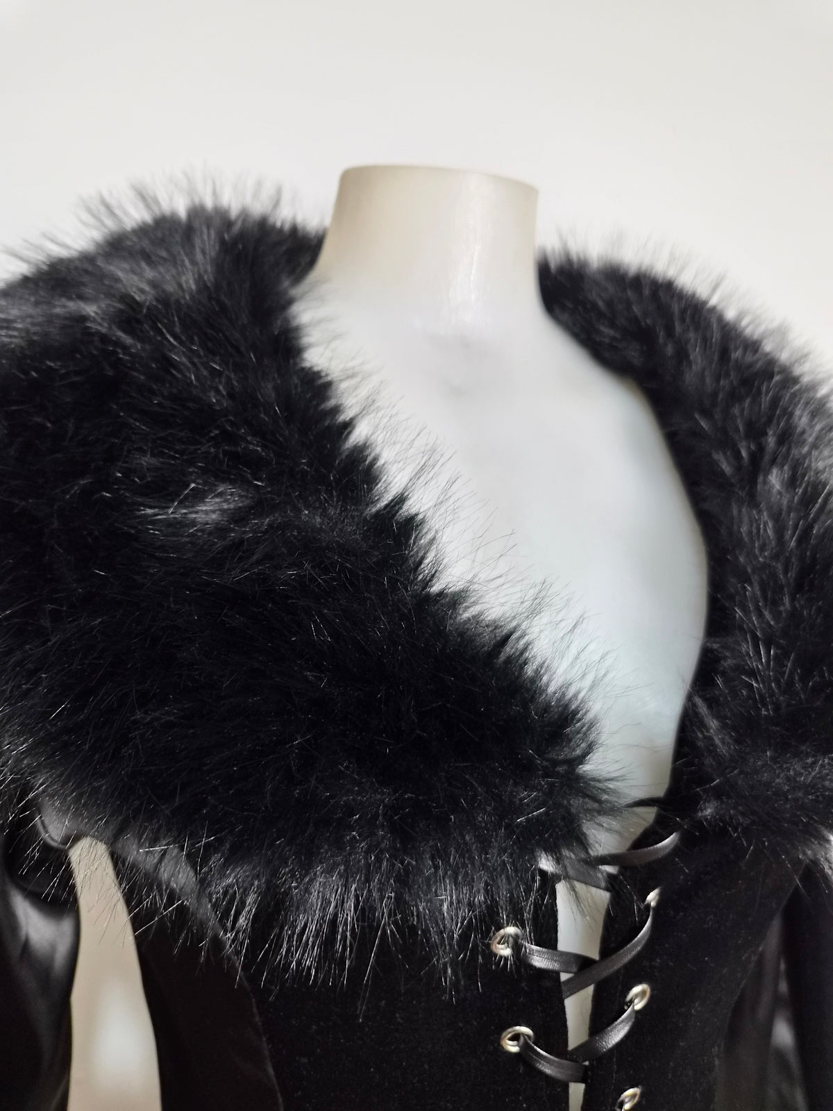 Black top with faux fur collar