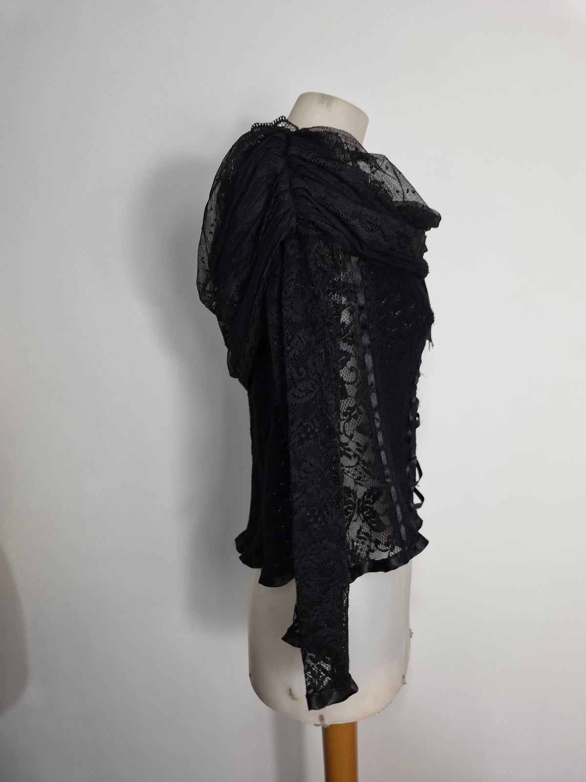 Black top with lace and floral details