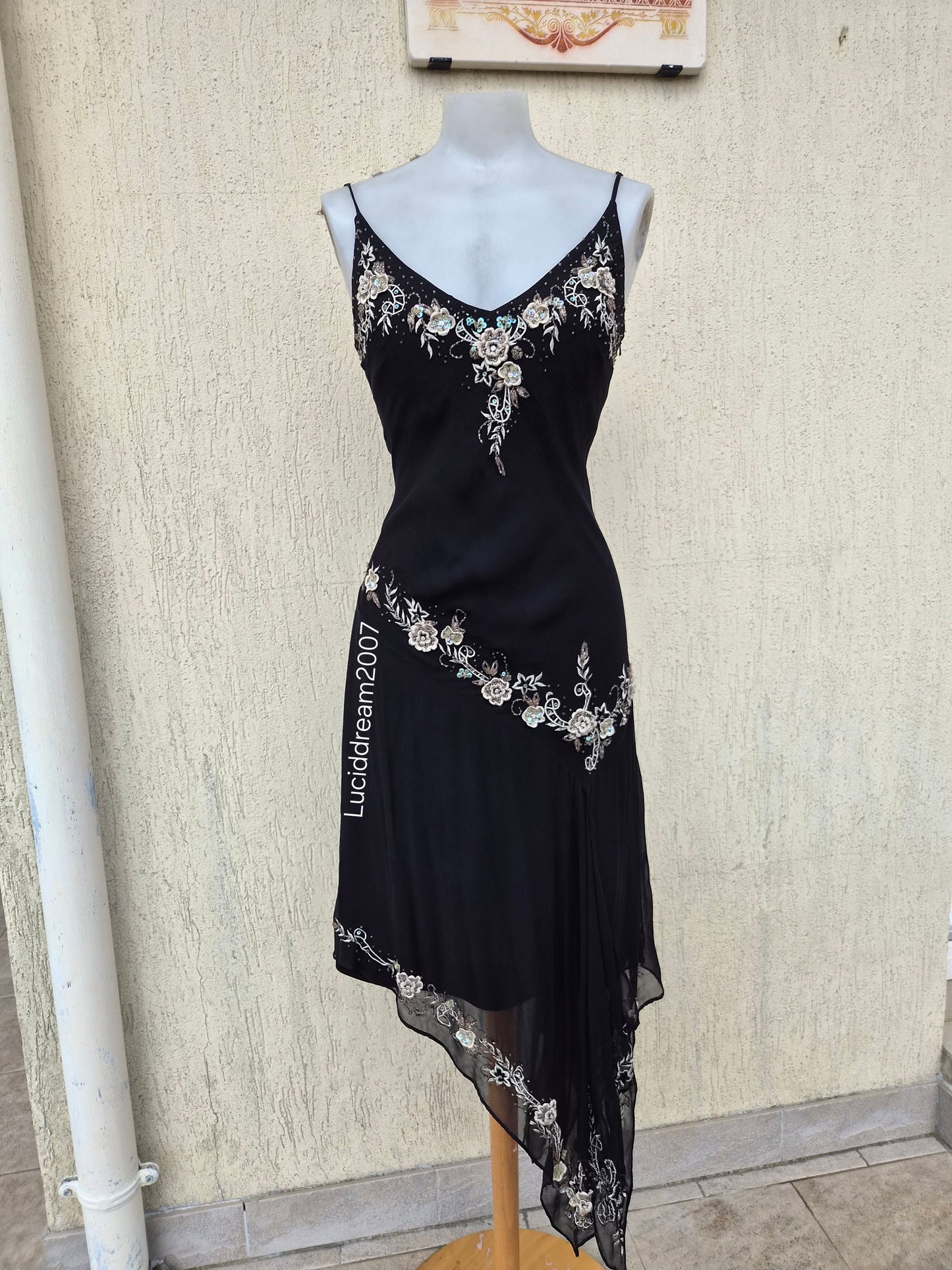 Black silk dress with embroidered details