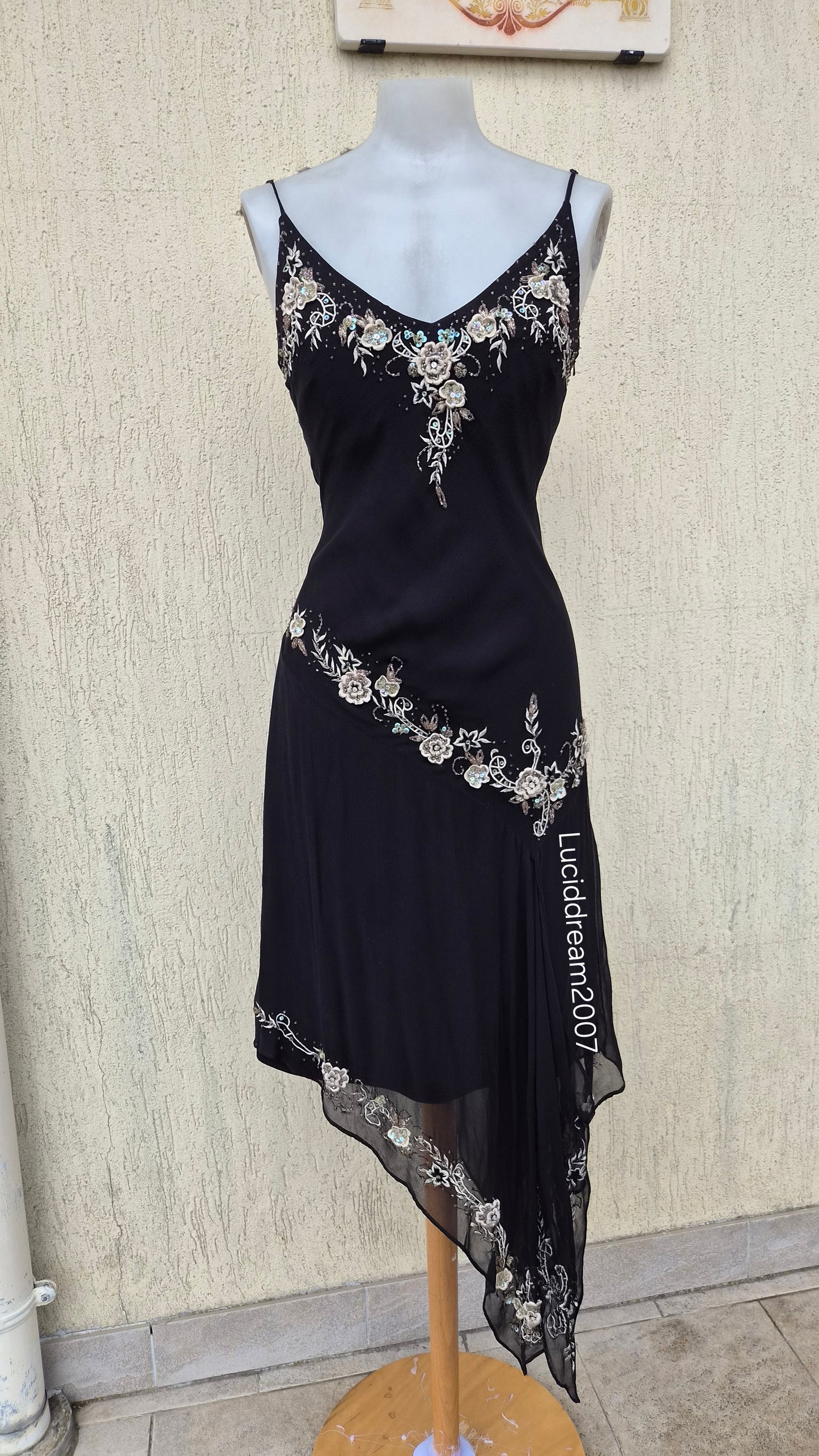 Black silk dress with embroidered details