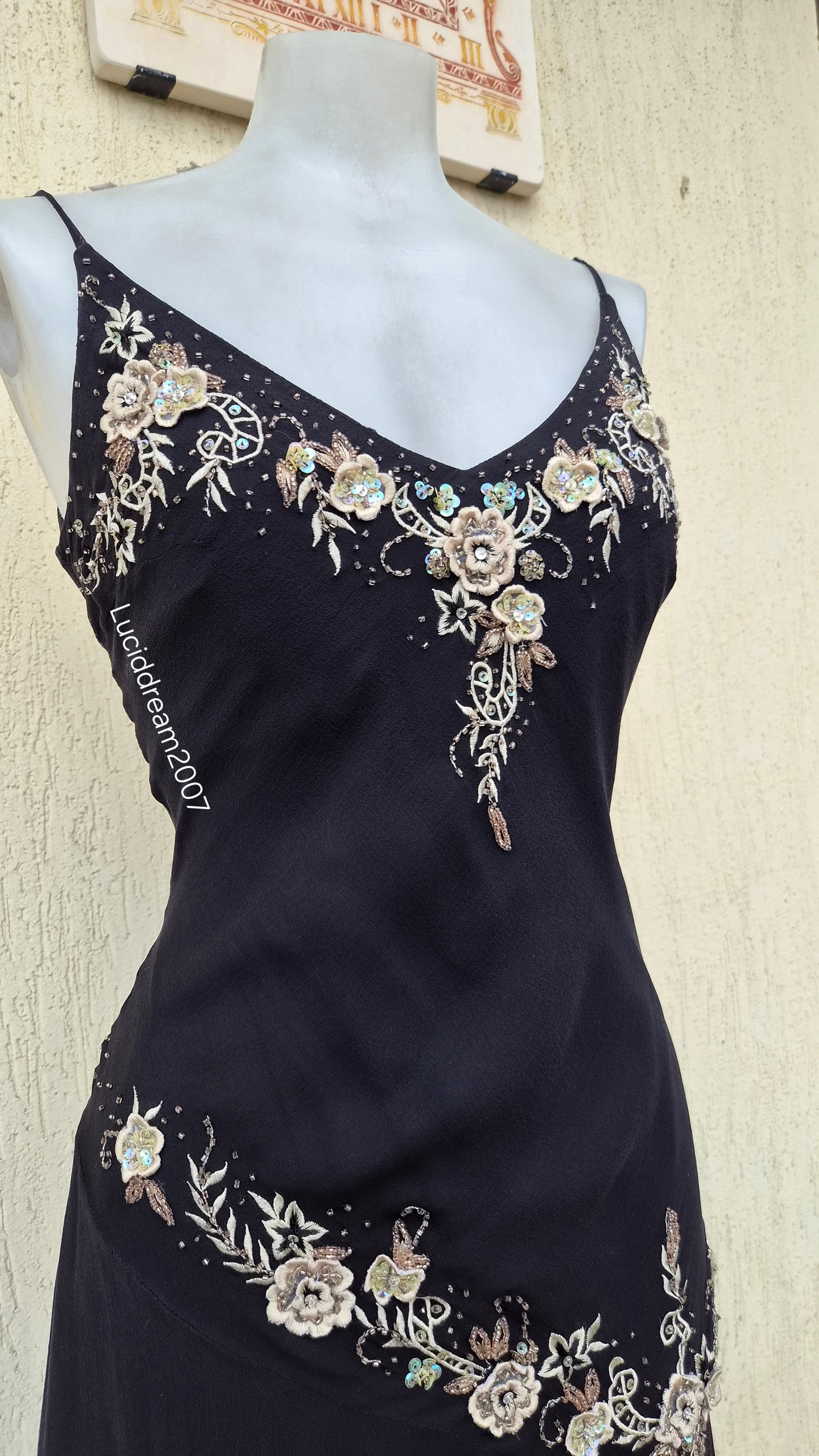 Black silk dress with embroidered details
