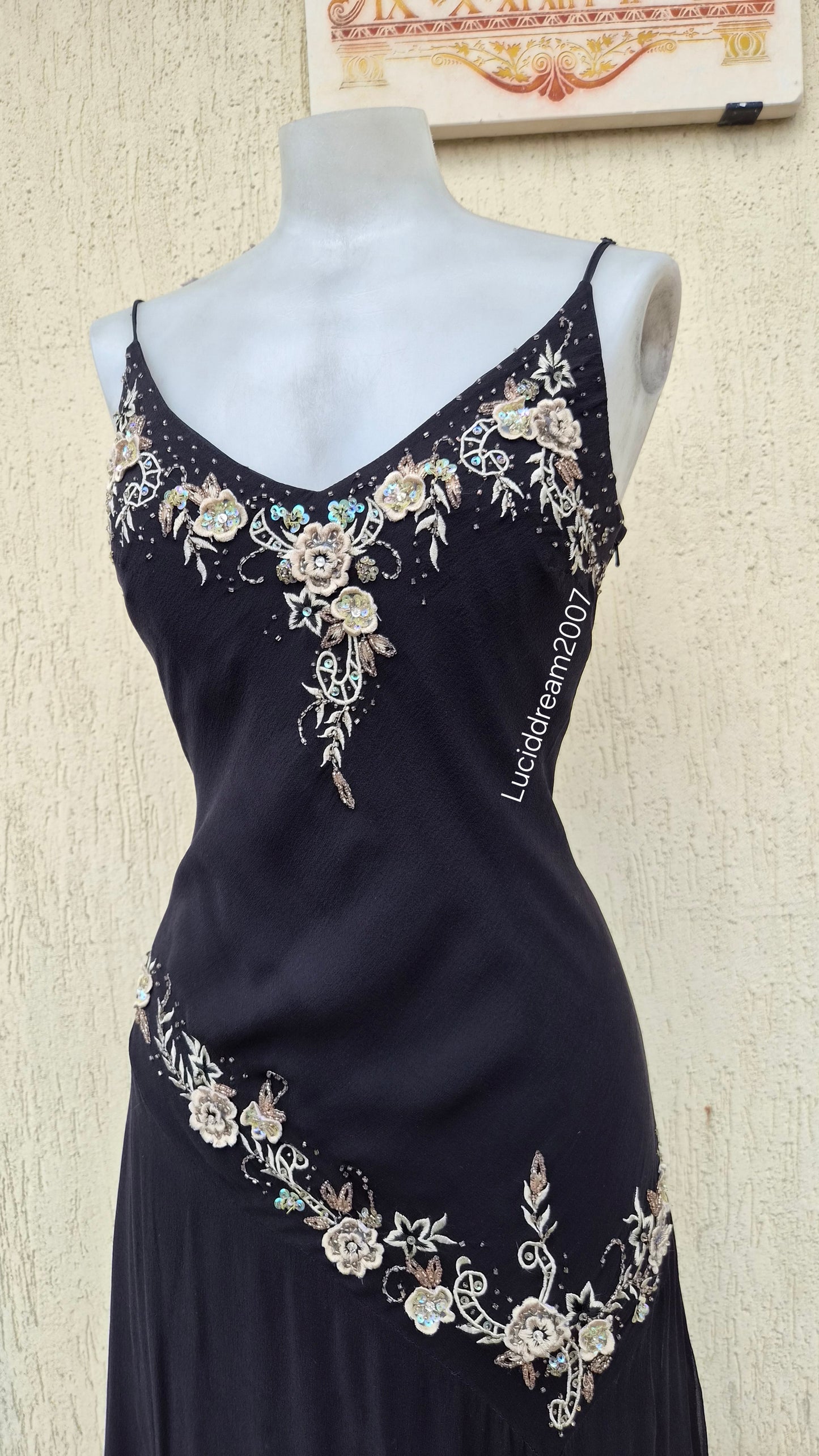 Black silk dress with embroidered details