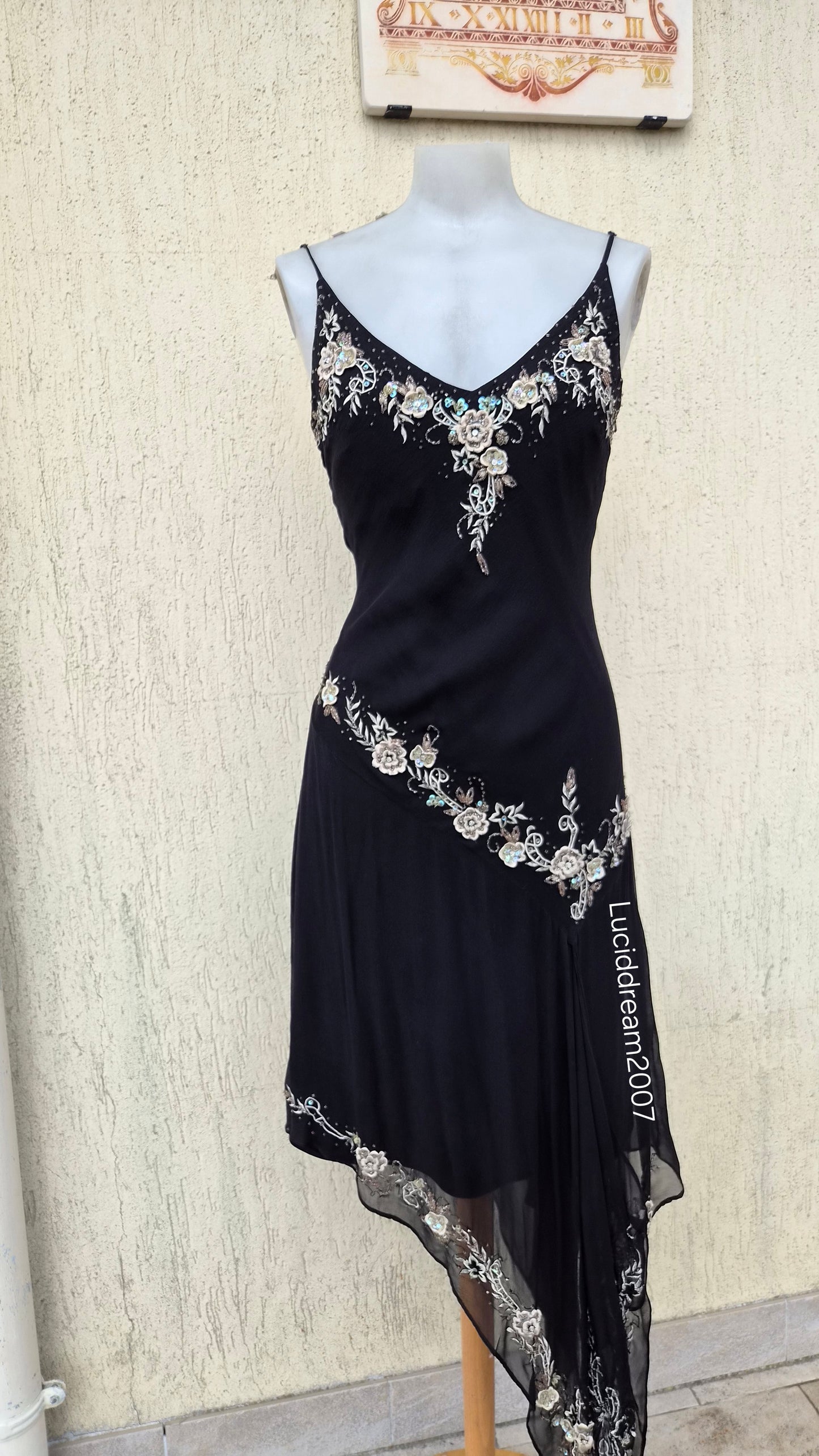 Black silk dress with embroidered details