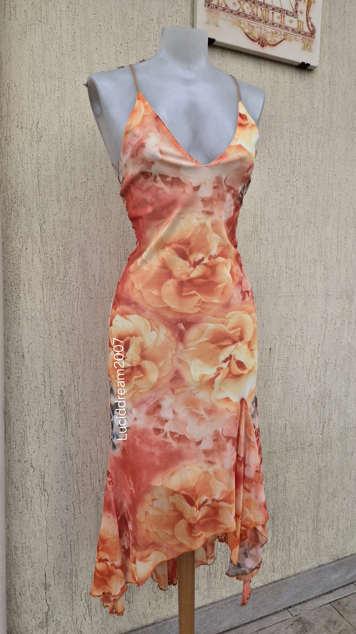 Robe fleurie dos nu tons oranges