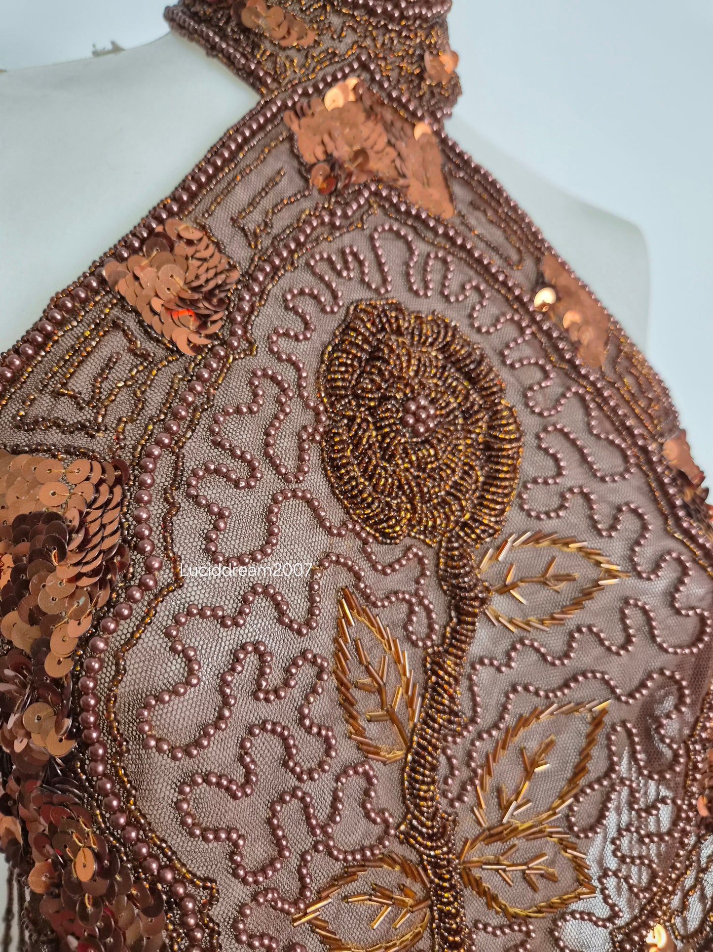 Brown backless top embroidered with beads and sequins