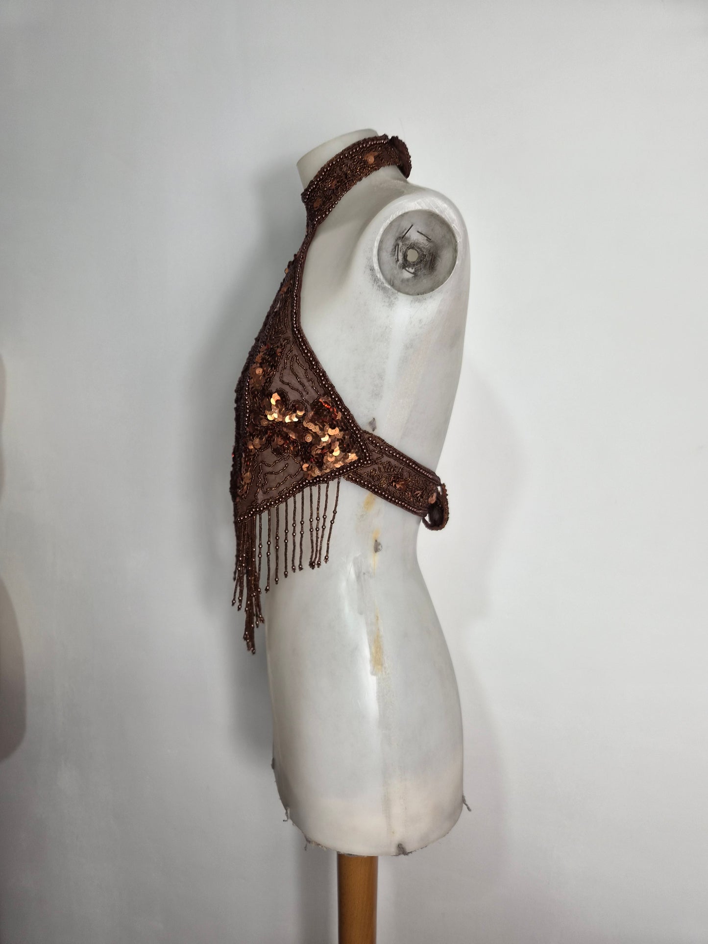 Brown backless top embroidered with beads and sequins
