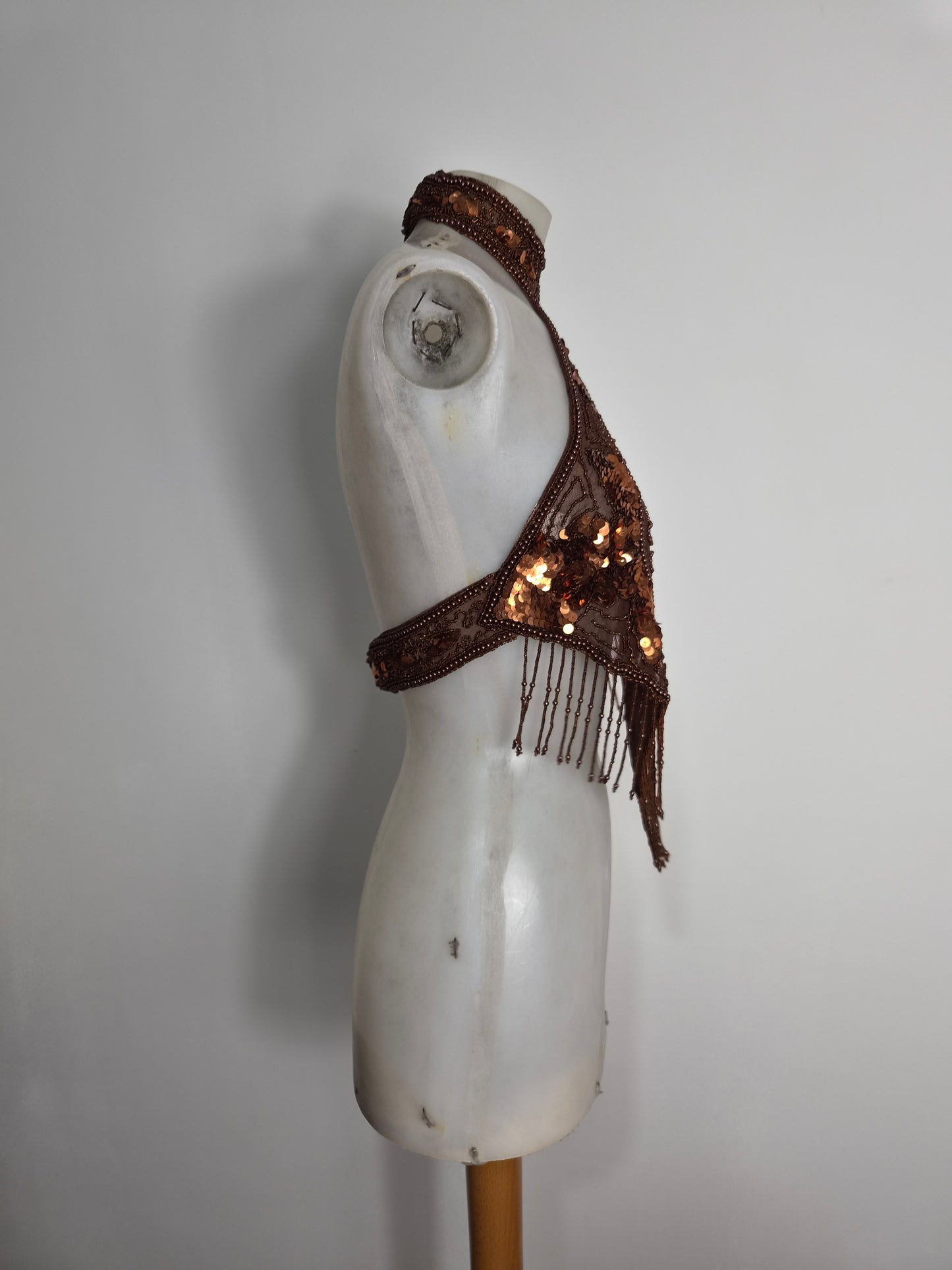 Brown backless top embroidered with beads and sequins