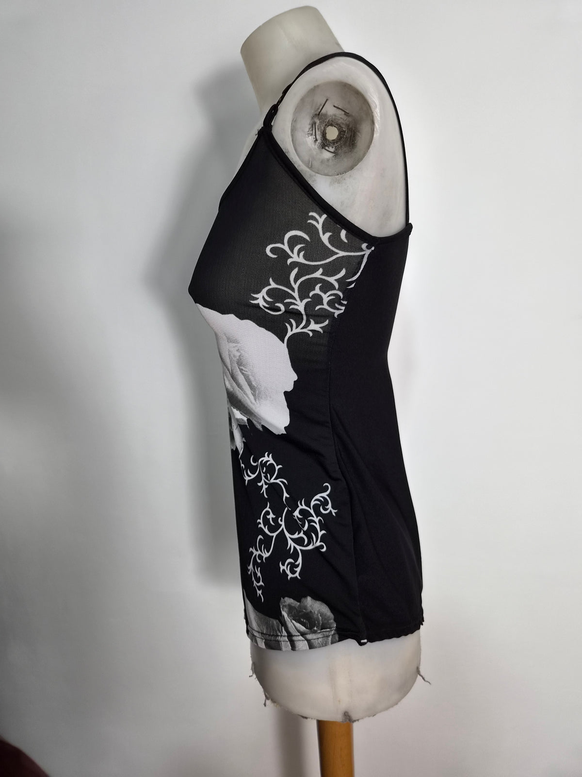 Haut asymétrique noir motif fleur