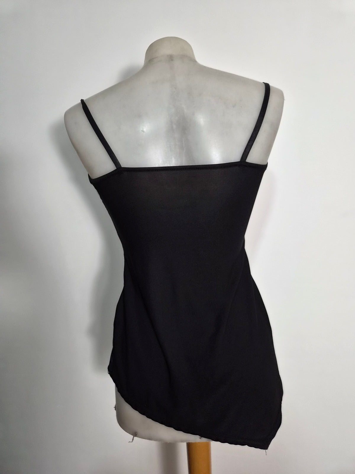 Haut asymétrique noir motif fleur
