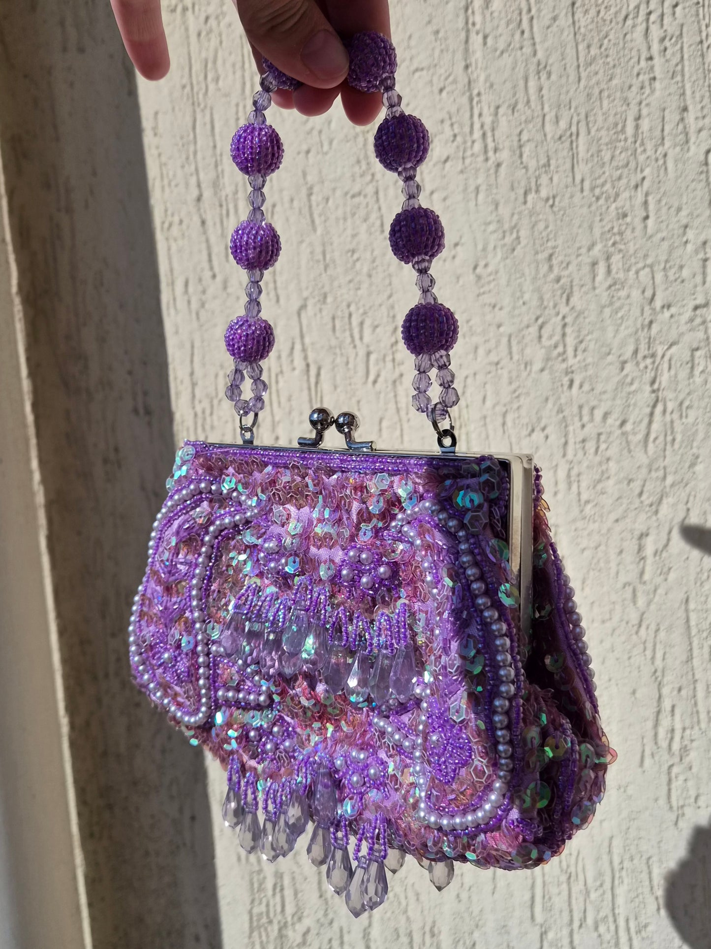 Small embroidered purple pouch