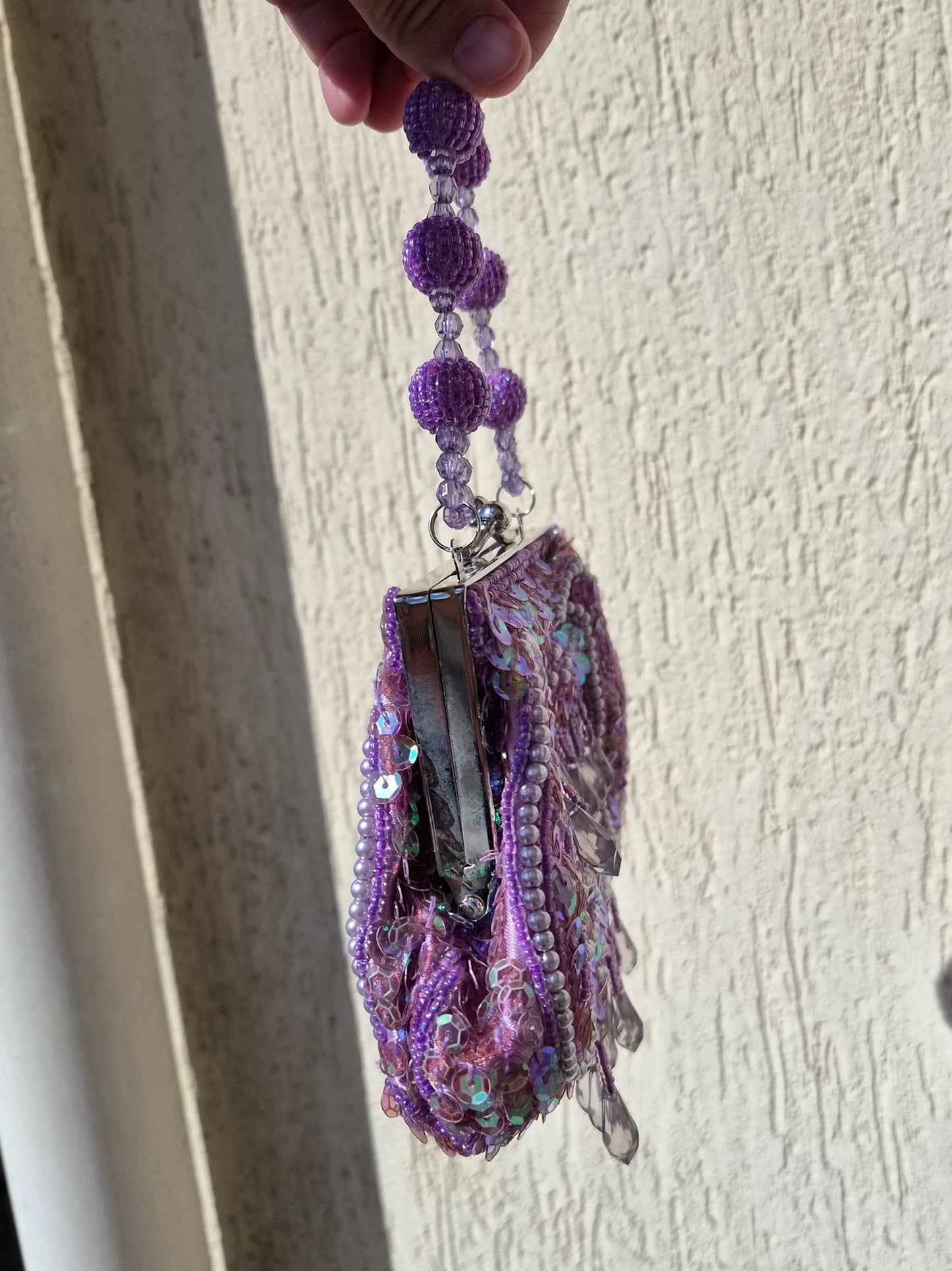 Small embroidered purple pouch