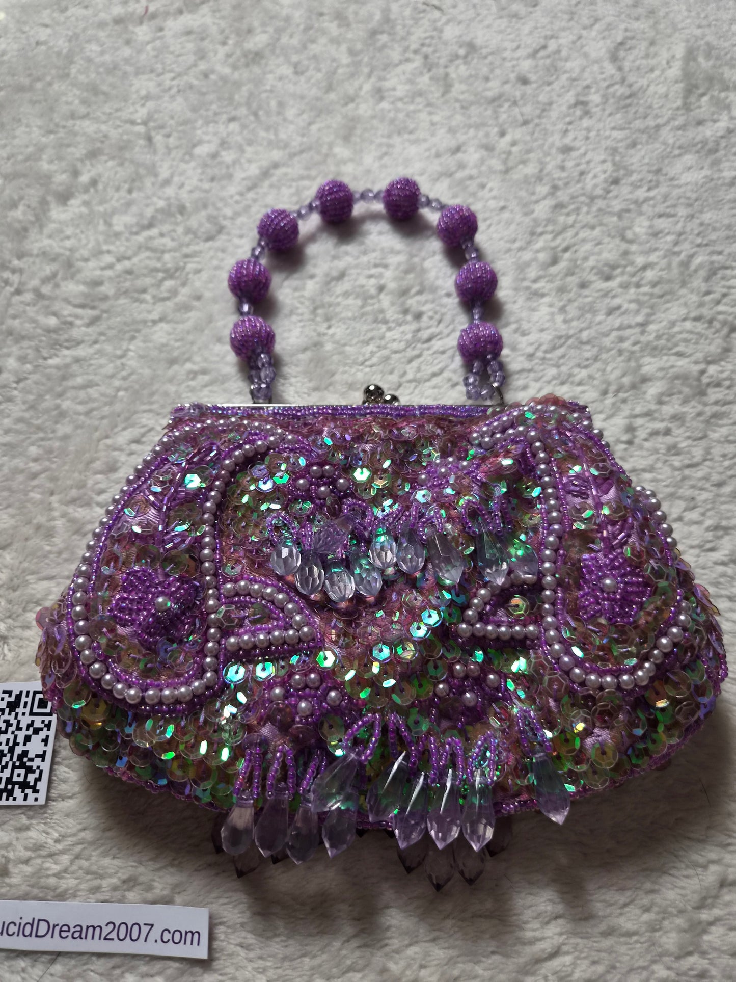 Small embroidered purple pouch