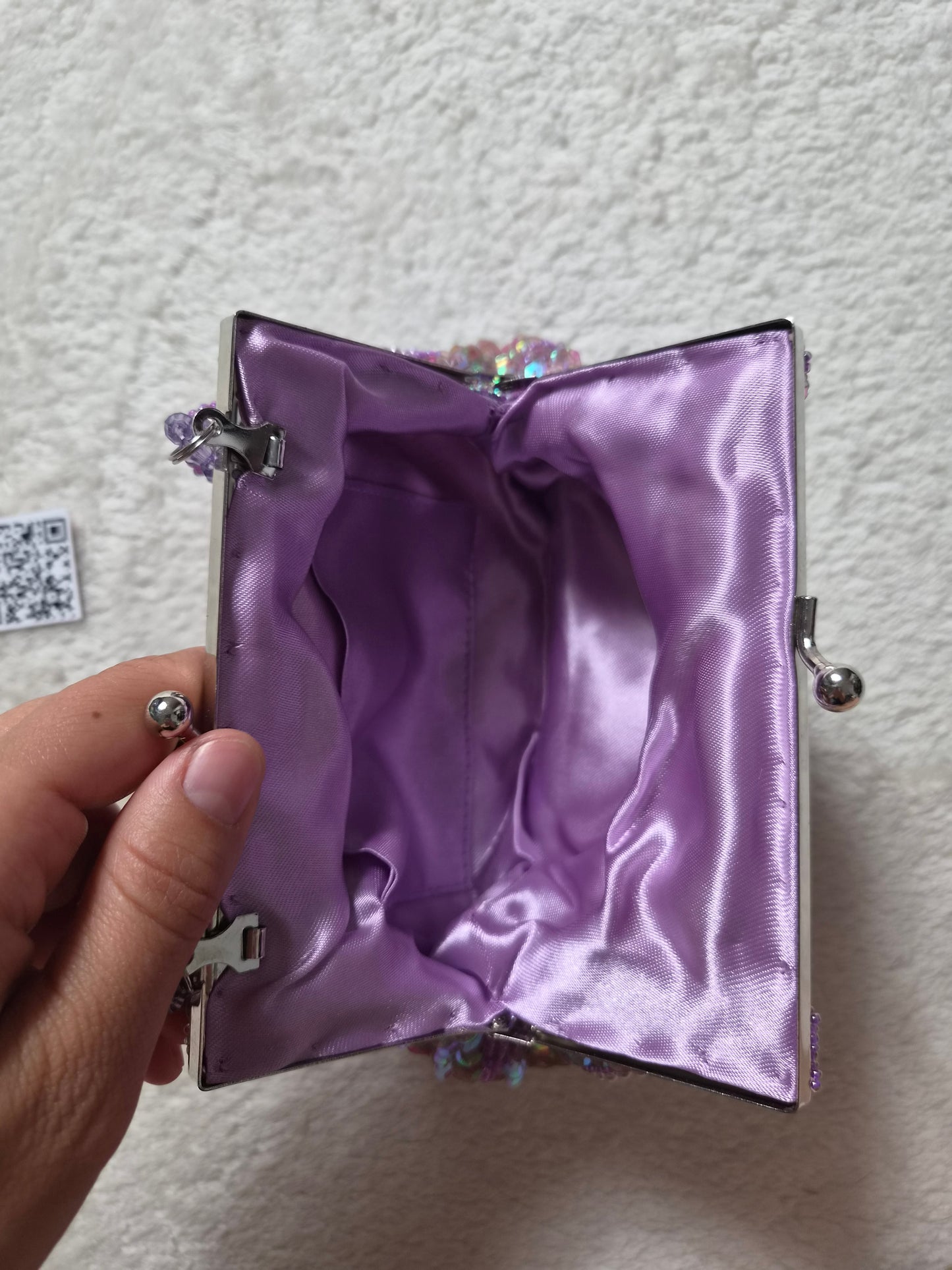 Small embroidered purple pouch